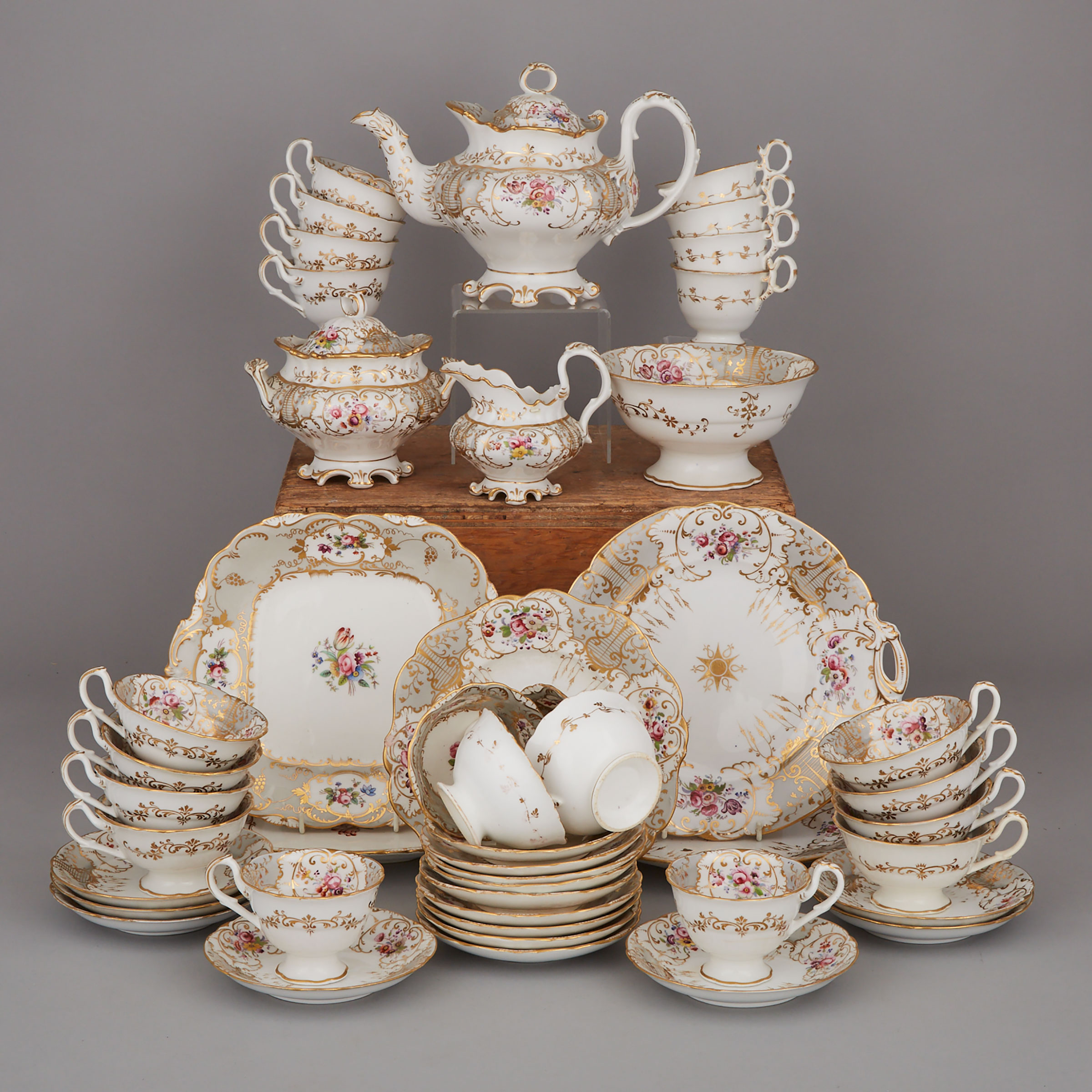 Assembled English Porcelain Grey and Gilt Ground Floral Decorated Tea Service, mid-19th century