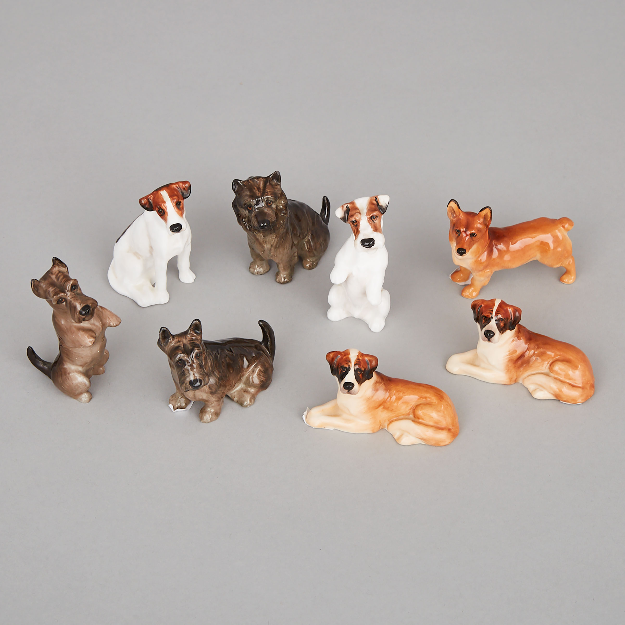 Eight Royal Doulton Miniature Dog Figurines, 20th century