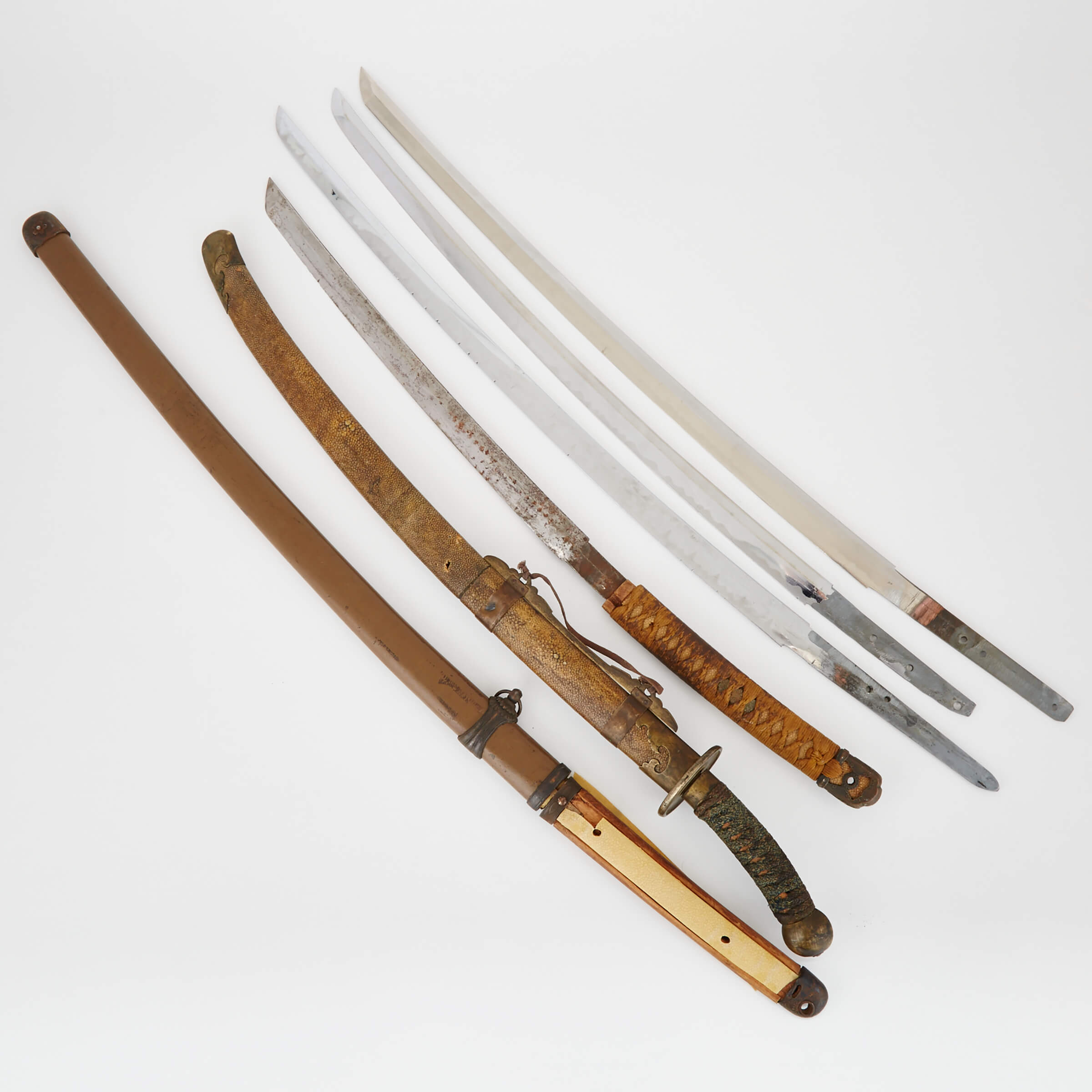 A Group of Eight Arms, Including Japanese Katana and Naginata, and a Chinese Sword, 19th/20th Century