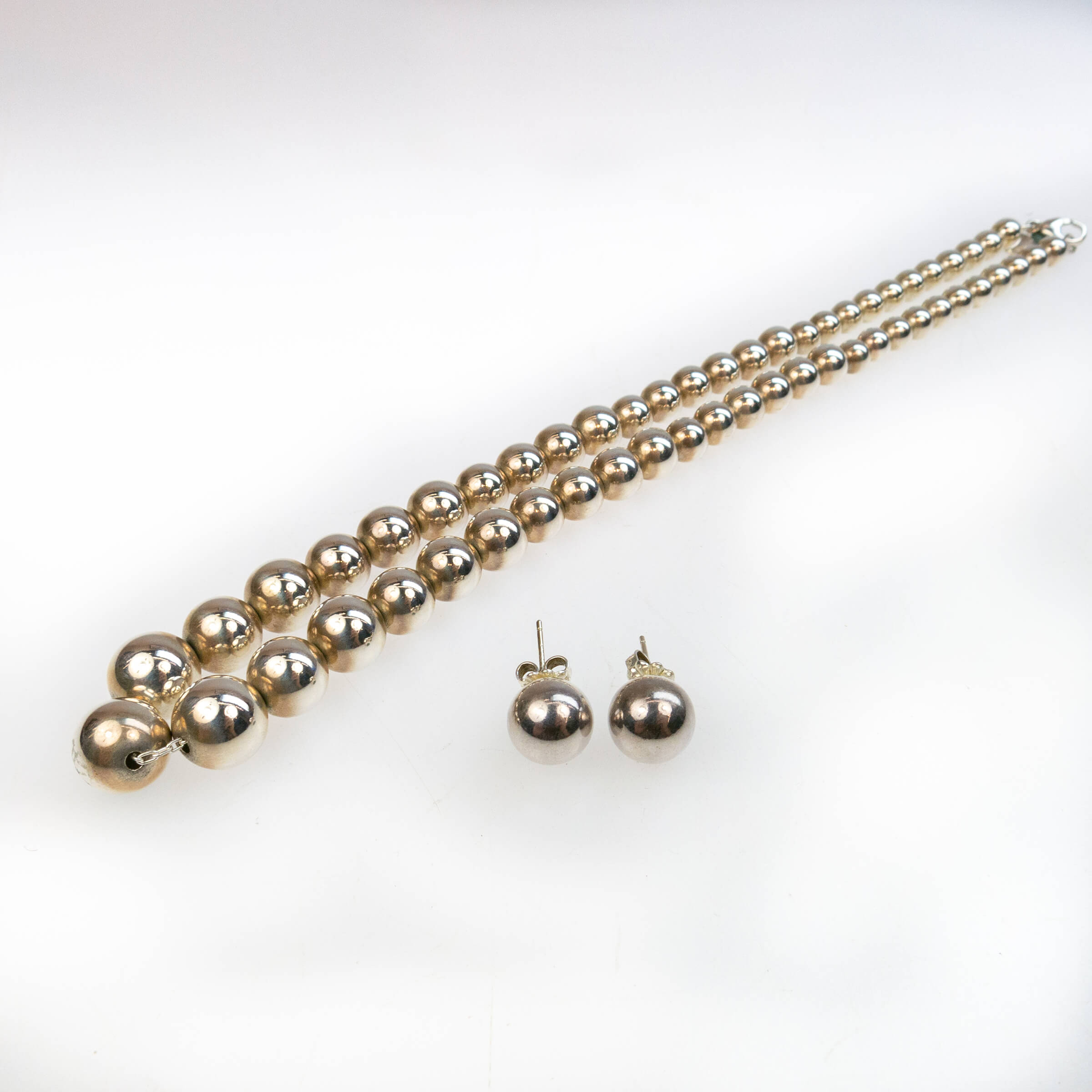 Tiffany & Co. Sterling Silver Graduated Bead Necklace And Stud Earrings