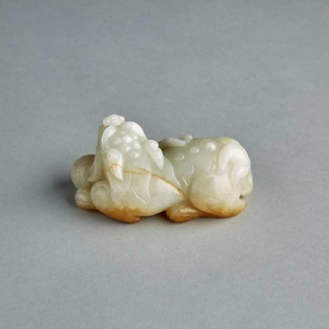 A White and Russet Jade Lion Carving 