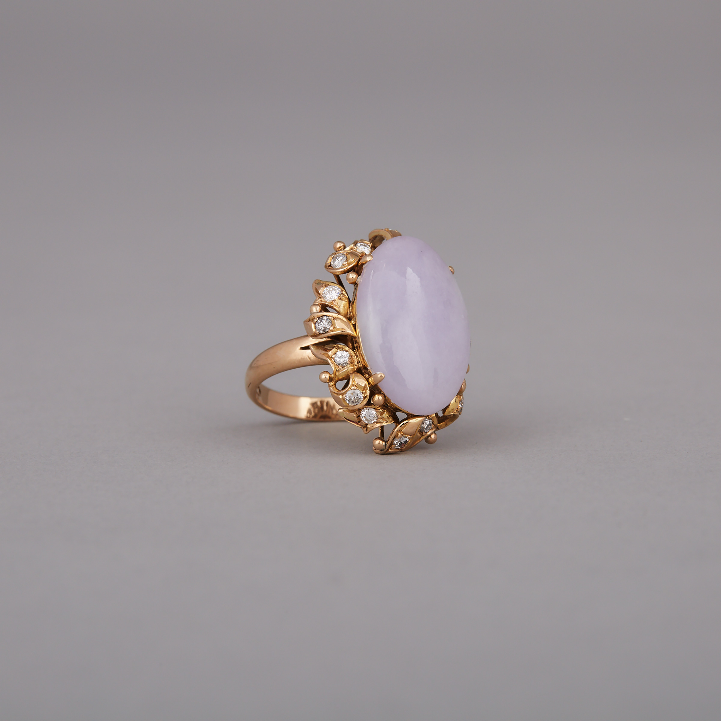 A Vintage Violet Jadeite Cabochon, 14k Gold and Diamond Cocktail Ring