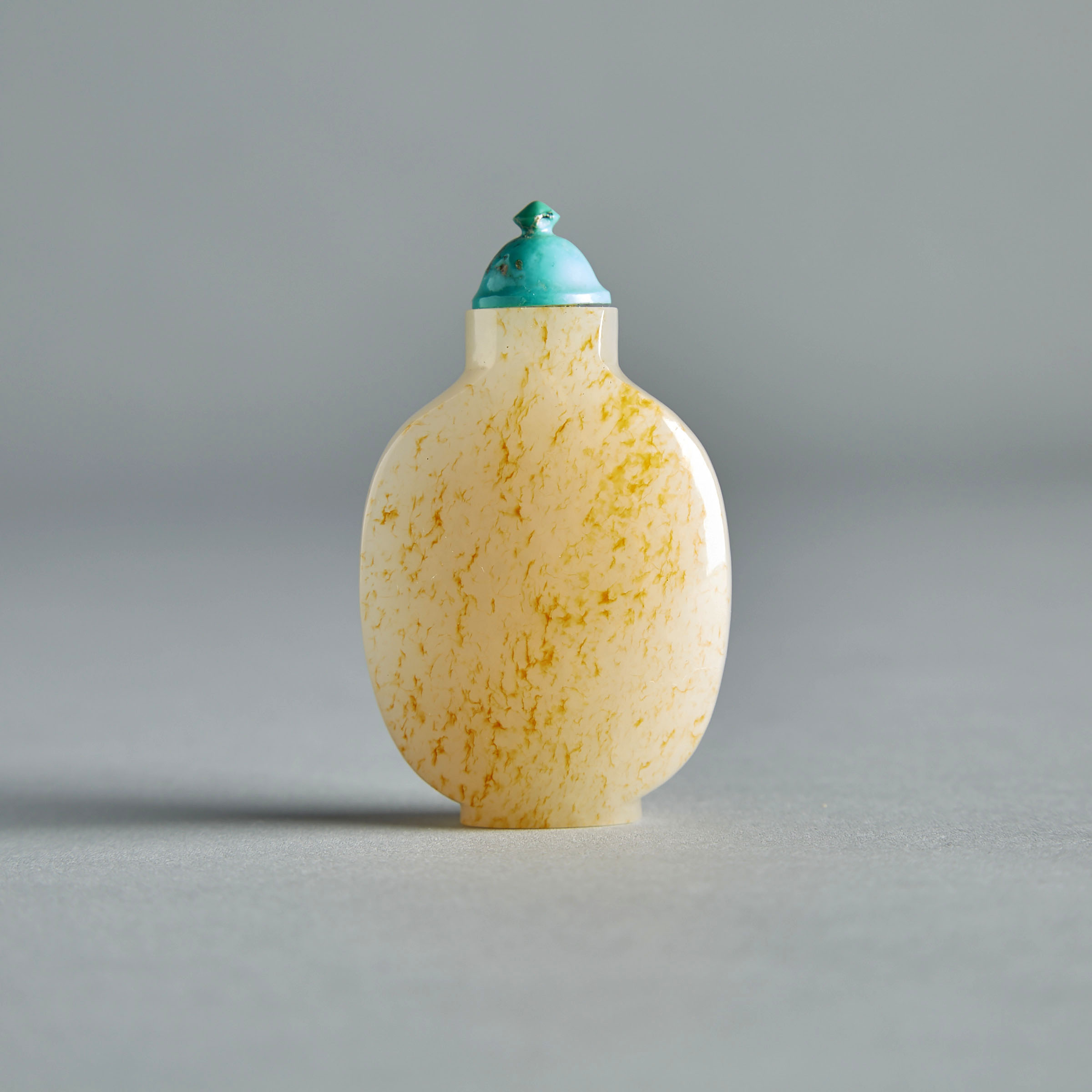 A White and Light Russet Jade Snuff Bottle, 18th/19th Century