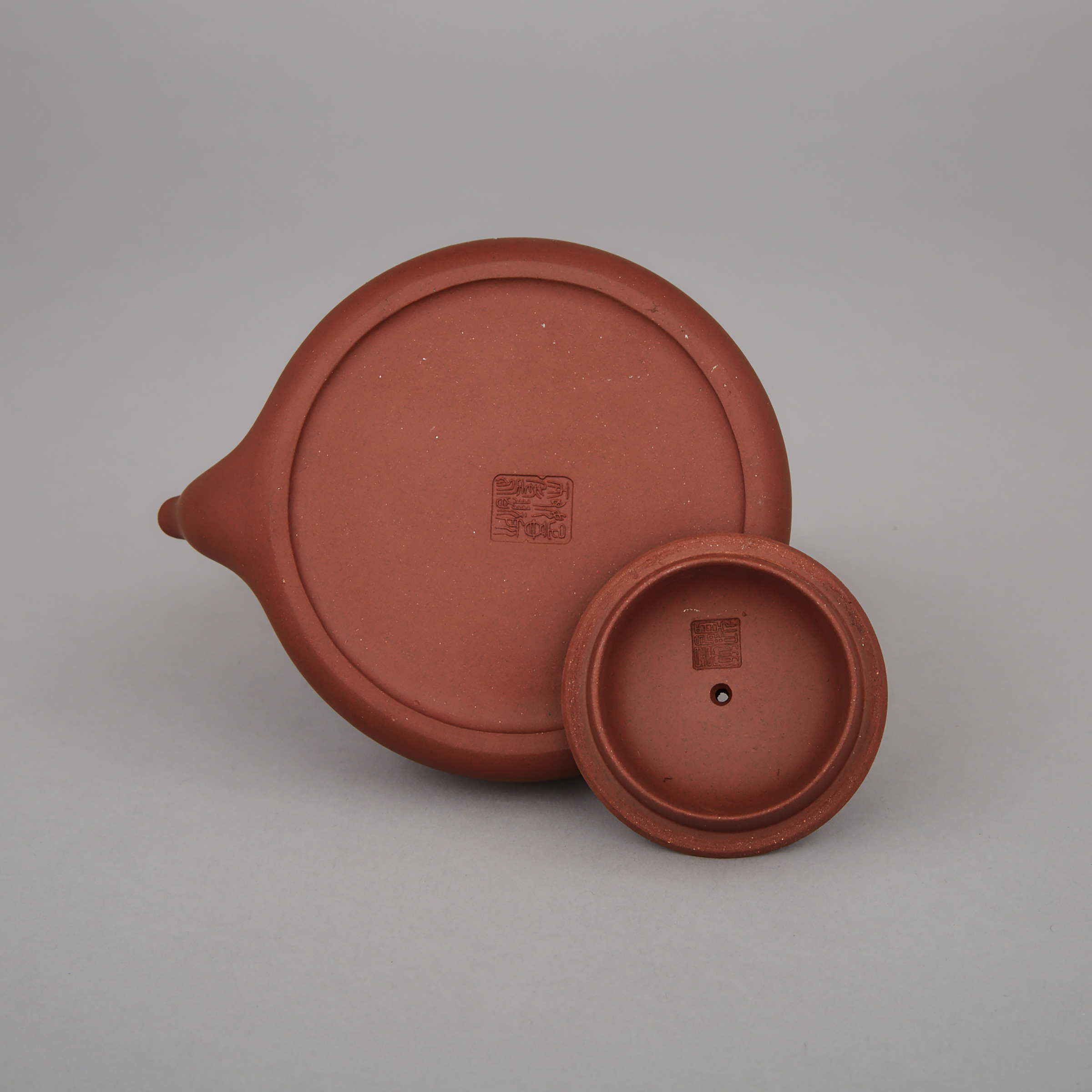 Gu Jingzhou (1915-1996), An Inscribed Yixing Stoneware Teapot and Cover
