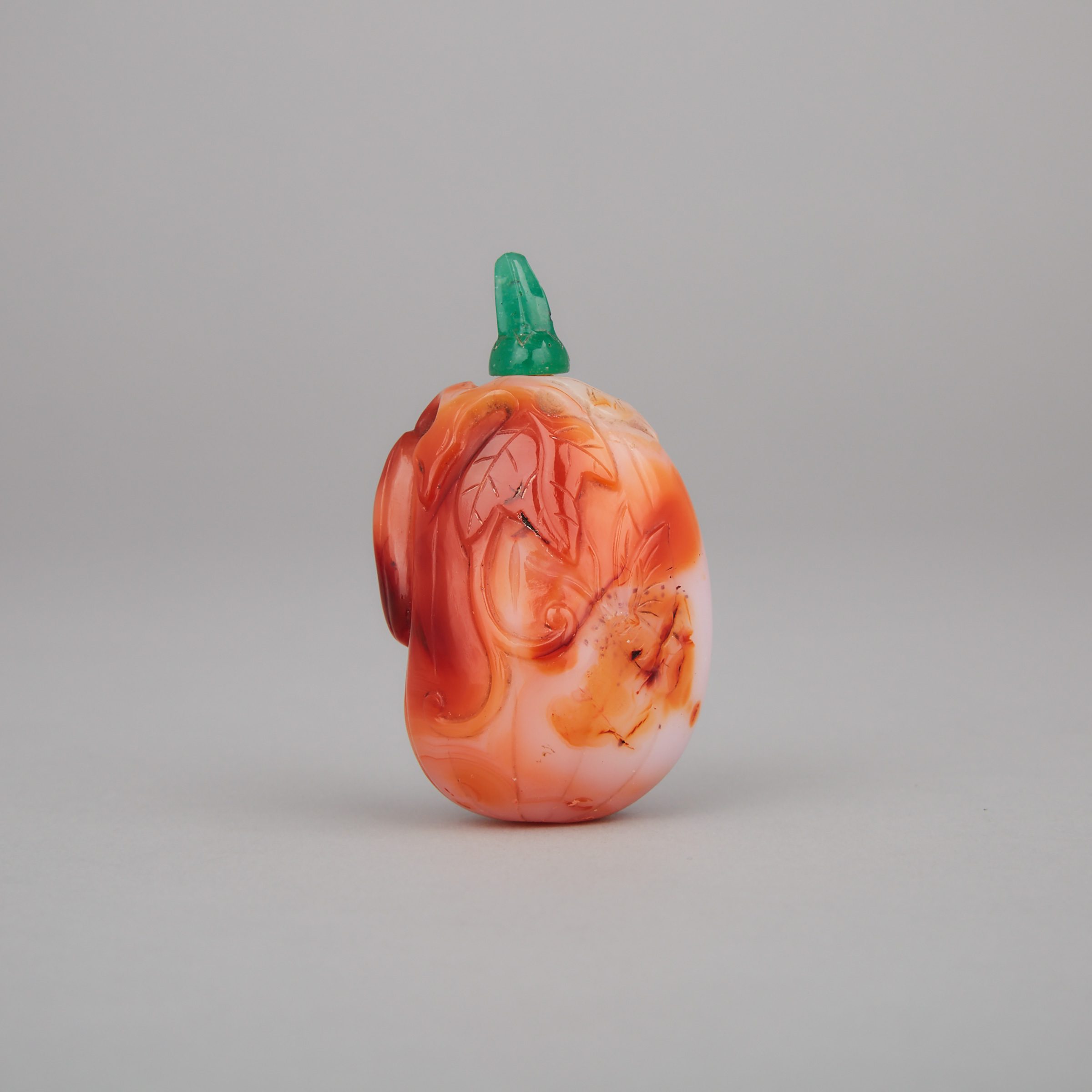 A Carnelian and White Agate Carved ‘Gourd’ Snuff Bottle, Qing Dynasty, 19th Century