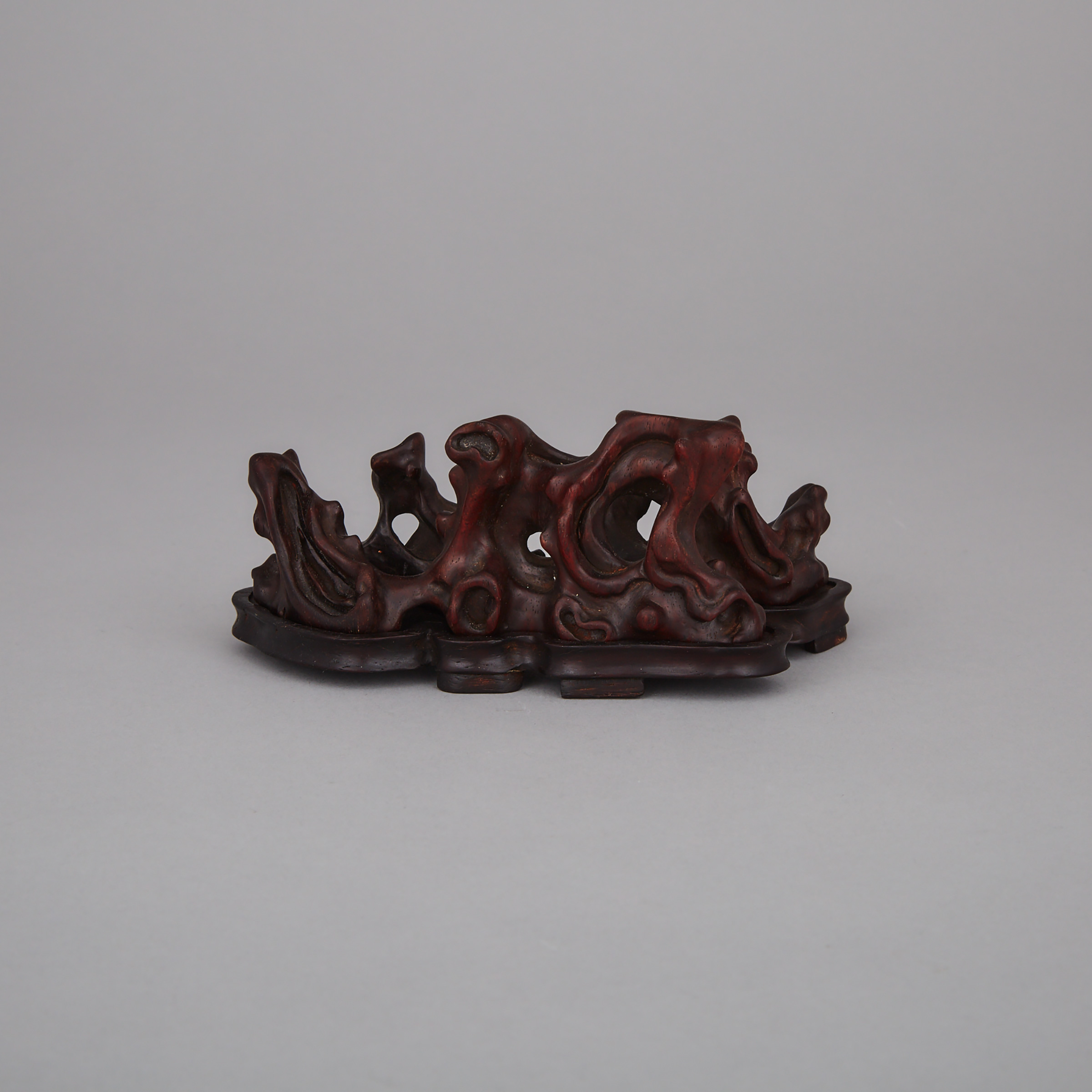 A Reticulated Zitan Scholar Carving with Stand, Qing Dynasty
