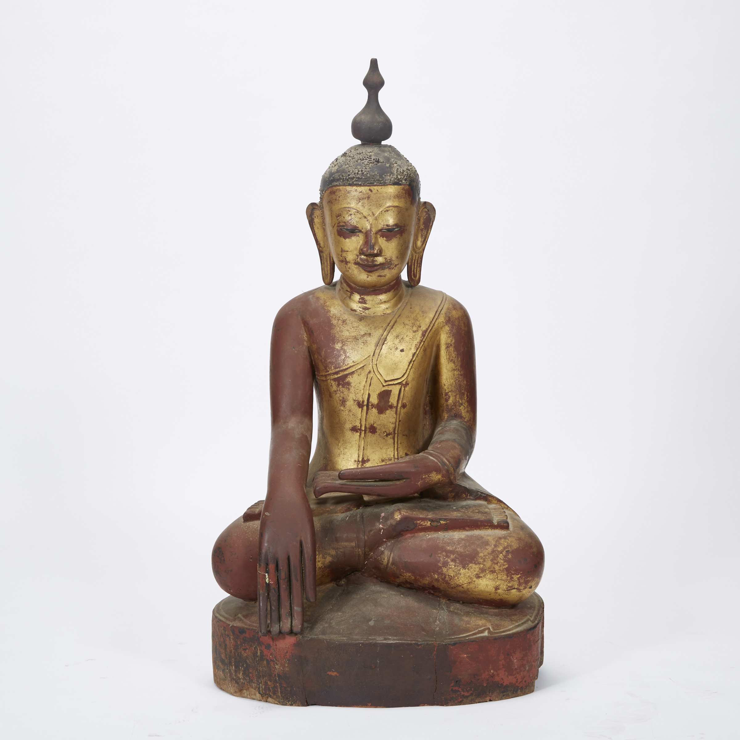 A Large Gilt and Red Lacquered Wooden Burmese Buddha, Shan Style, 18th/19th Century