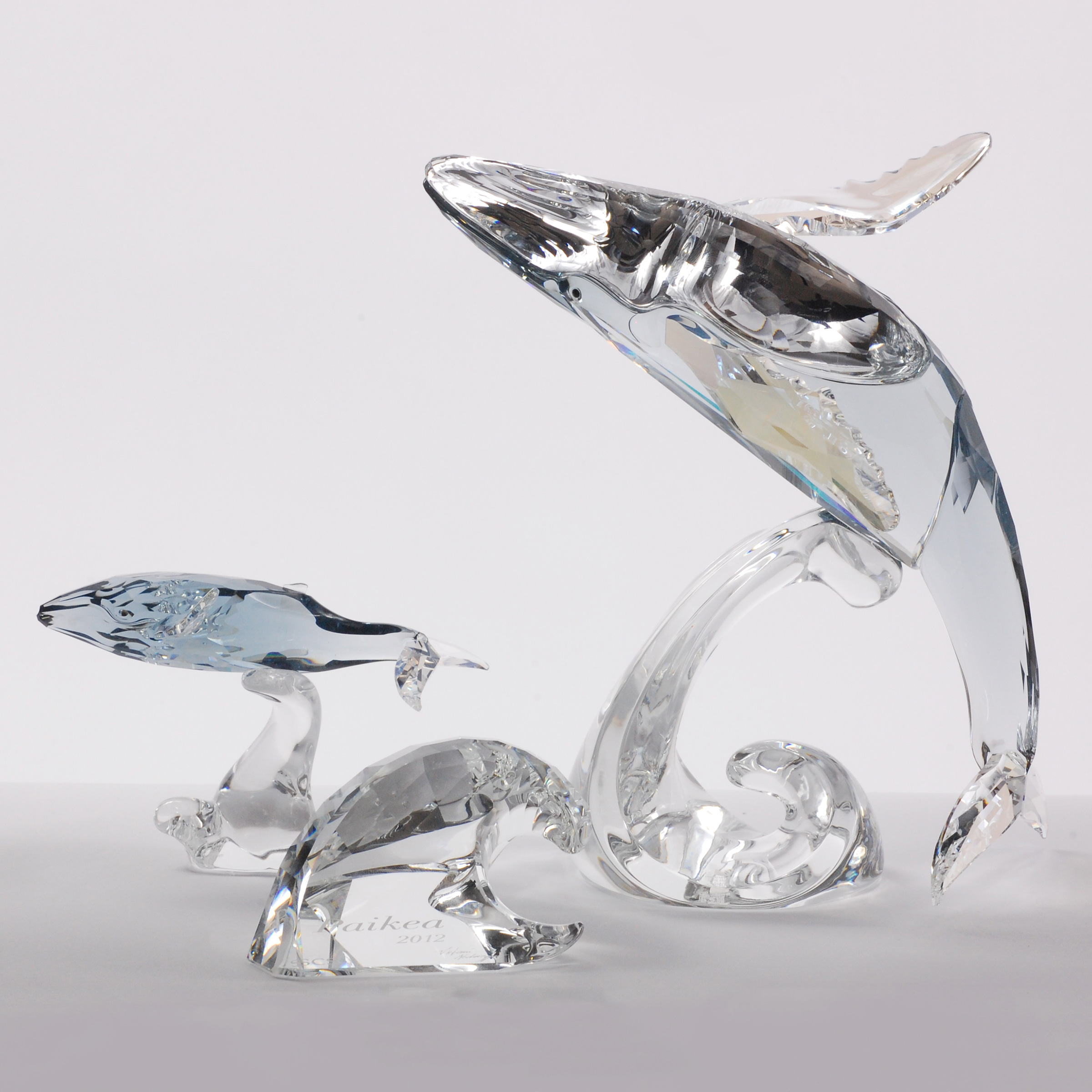 Two Swarovski Crystal Whales, early 21st century