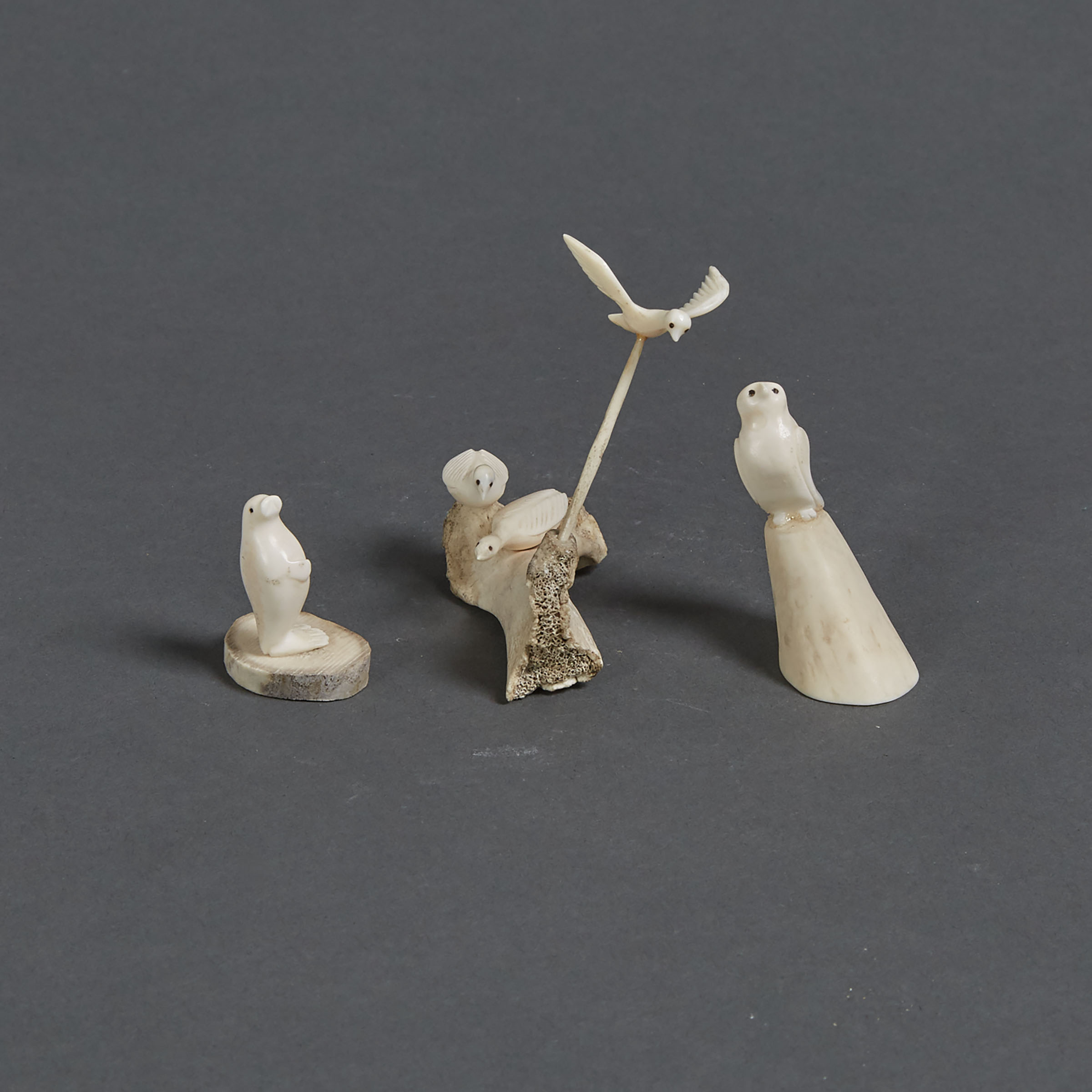 THREE IVORY MINIATURES OF ARCTIC BIRDS