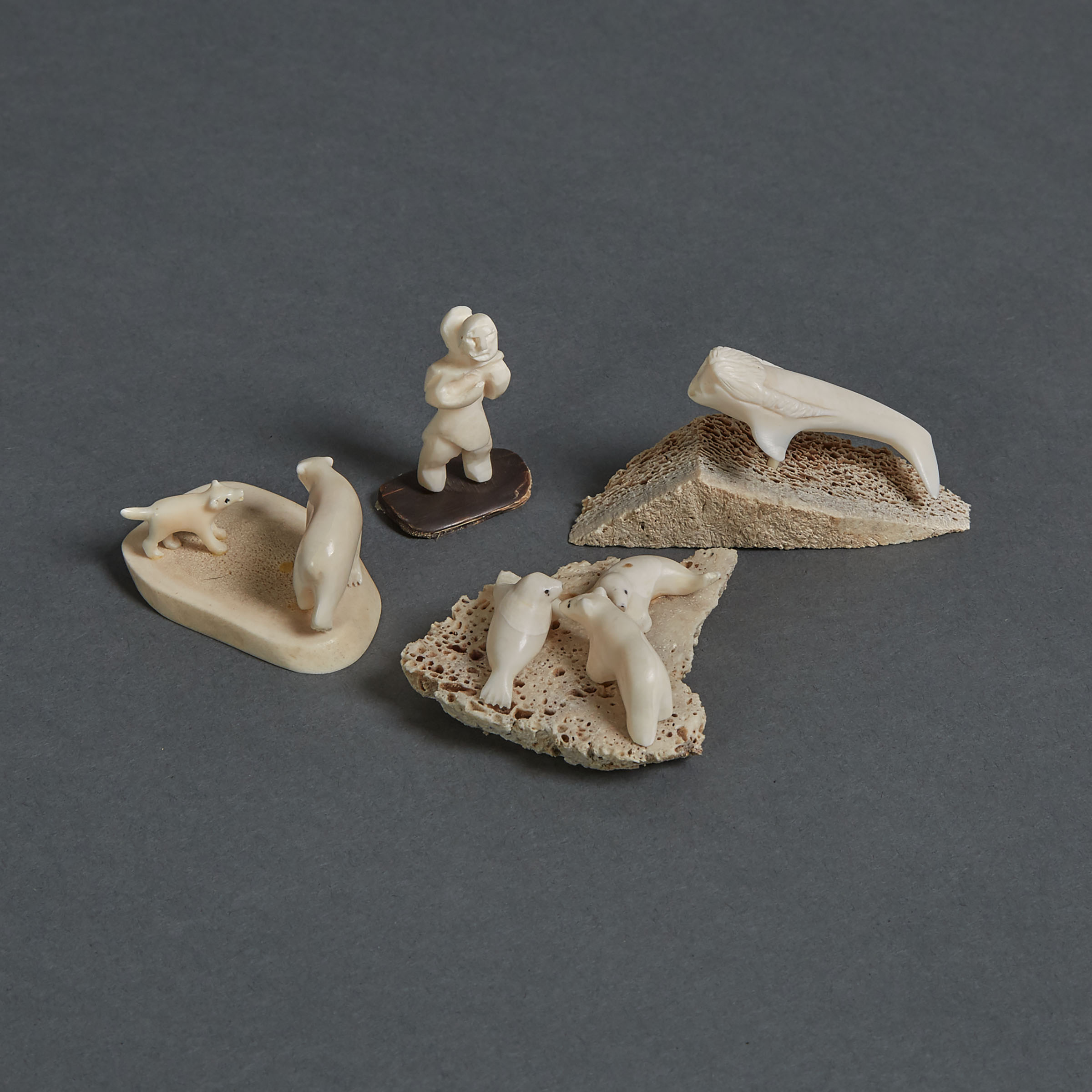 A COLLECTION OF FOUR IVORY MINIATURES