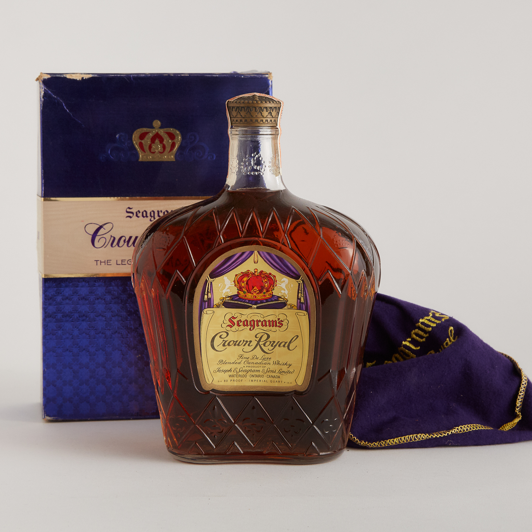 SEAGRAM'S CROWN ROYAL FINE DE LUXE BLENDED CANADIAN WHISKEY (ONE IMPERIAL QUART)