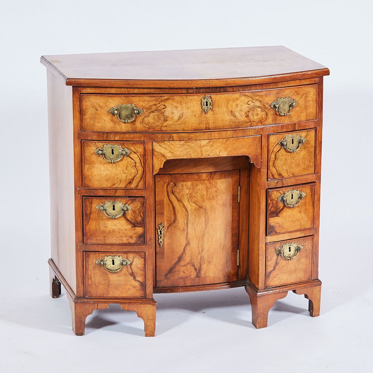 Small George II Style Figured Walnut Bow Front Kneehole Dressing Table, 19th century