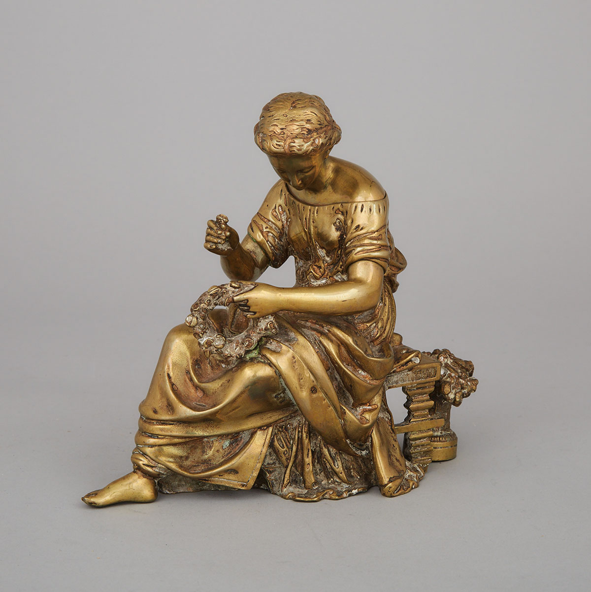 French Bronze Figure of a Seated Classical Maiden with Wreath, 19th century