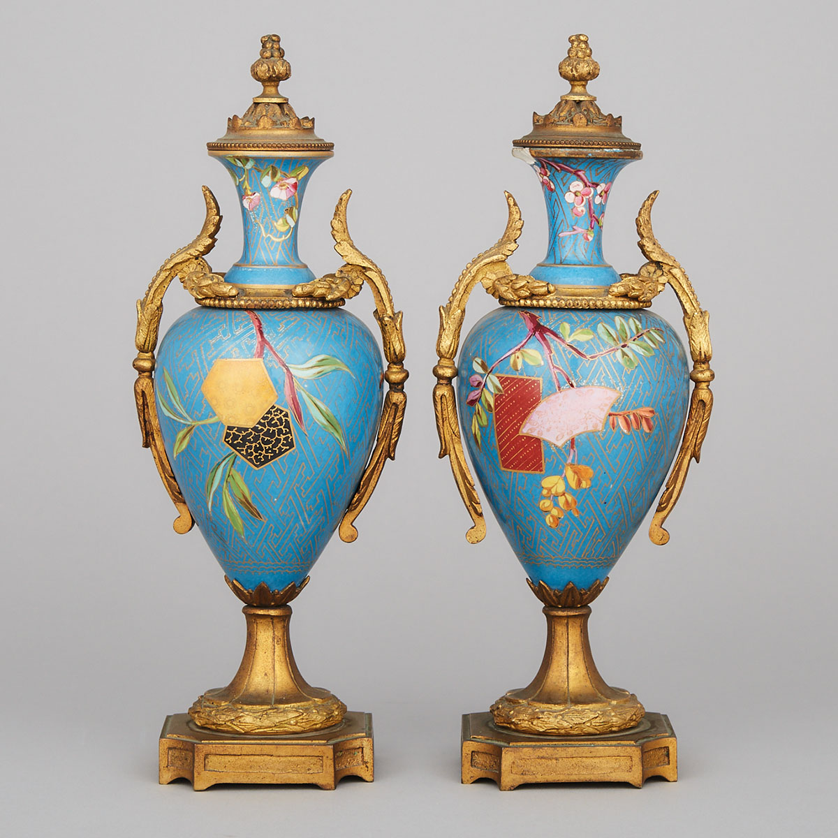 Pair of French Porcelain Ormolu Mounted Covered Vases, late 19th century
