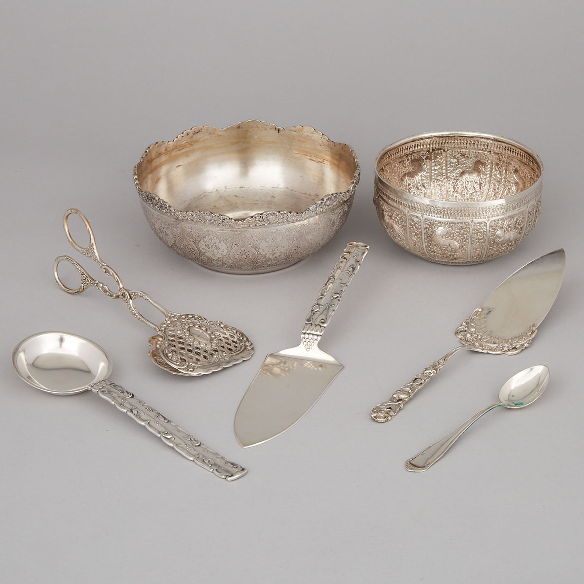 Two Eastern Silver Bowls and Five Pieces of German Flatware, 20th century