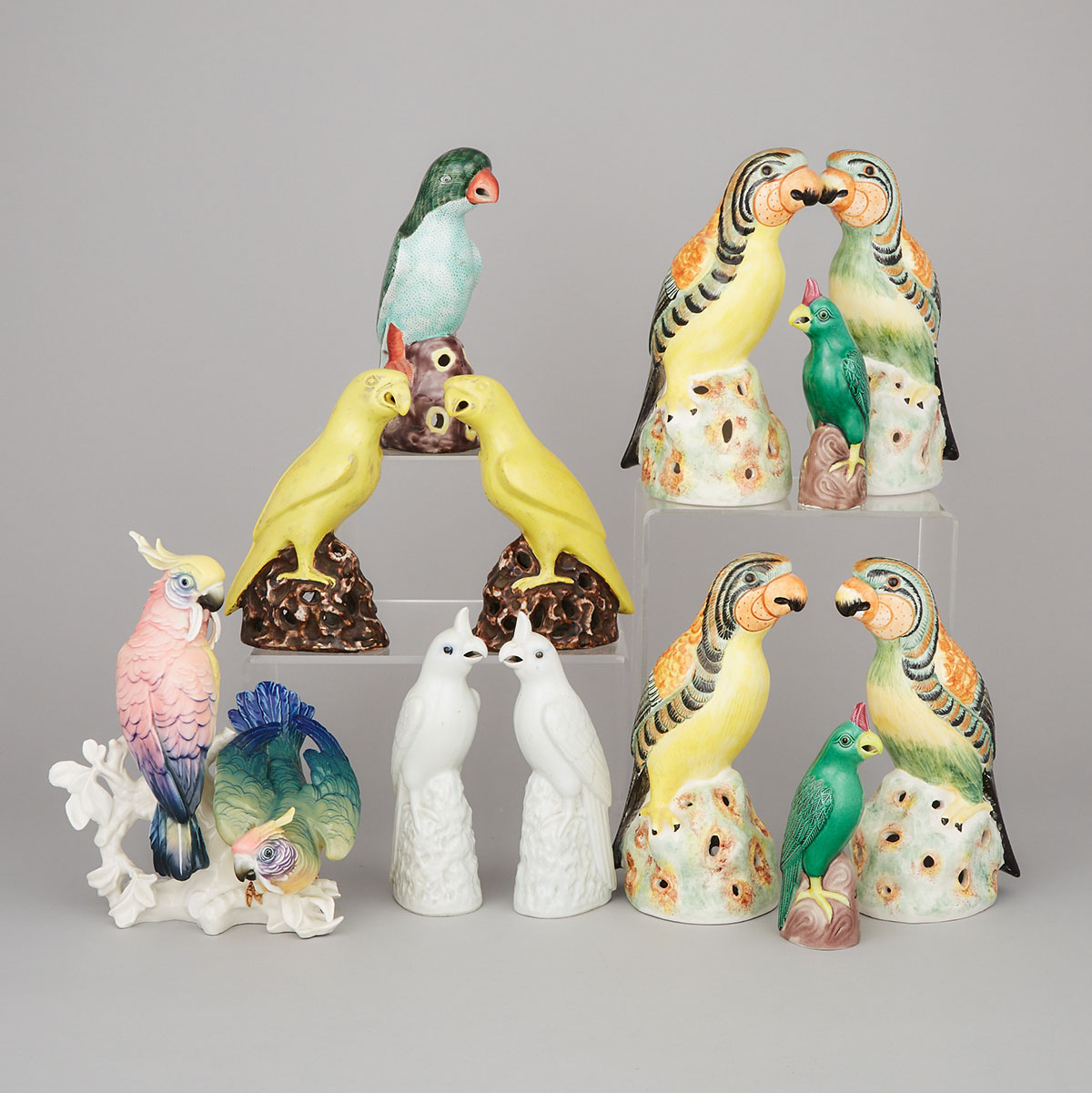 Eleven Italian Pottery and Chinese Porcelain Models of Parrots and a Karl Ens Group of Cockatoos, 20th century