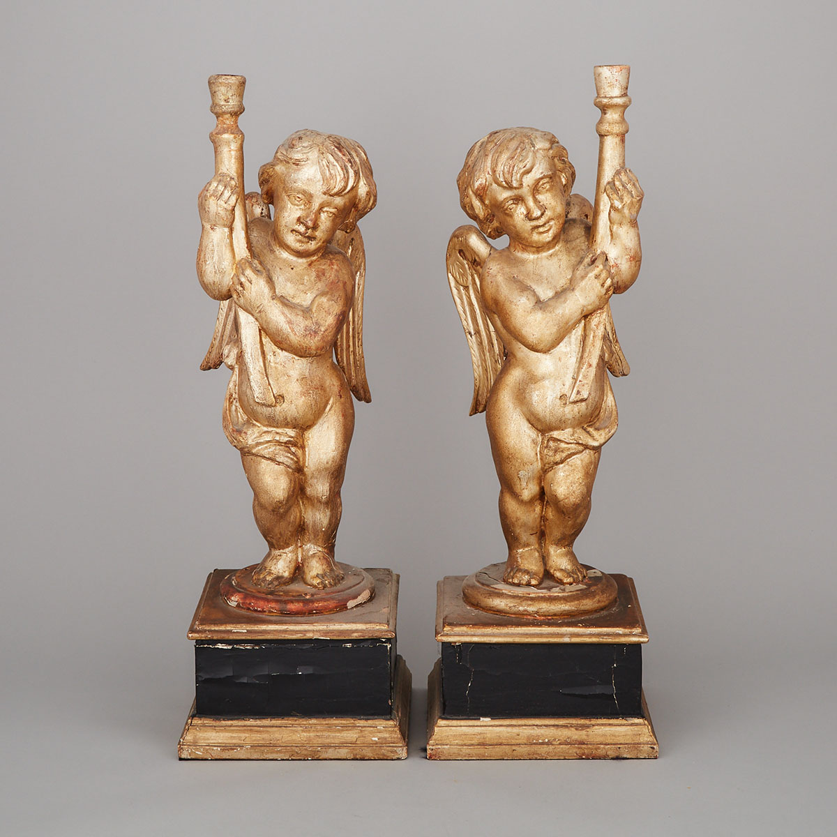 Pair of Italian Carved and Silver Gilt Cherub Form Table Lamps, early/mid 20th century