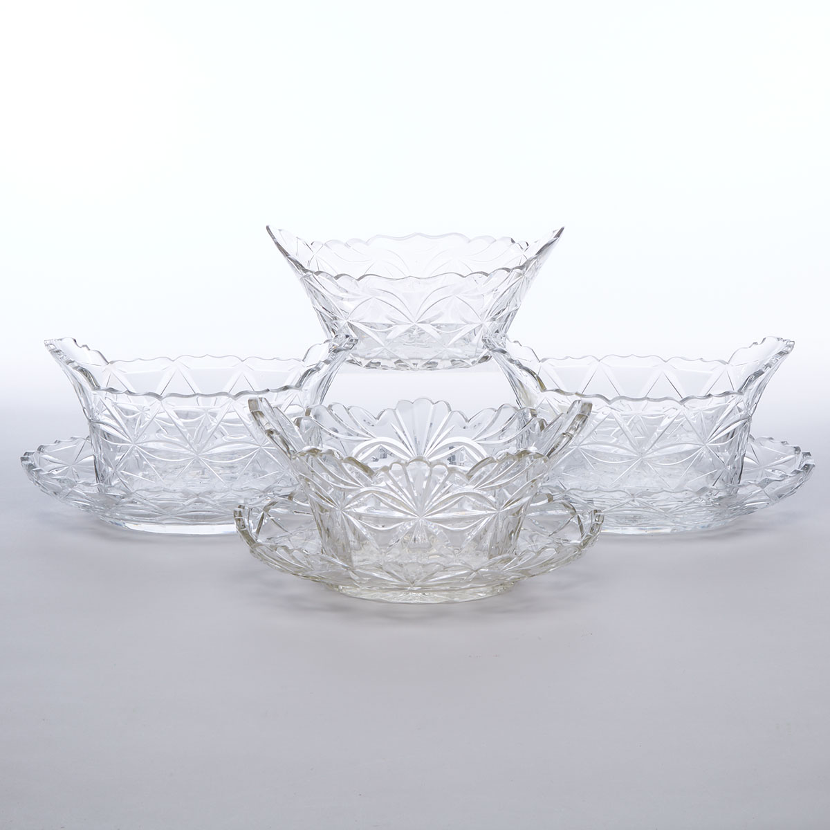 Four Continental Cut Glass Oval Bowls and Three Stands, late 19th/early 20th century