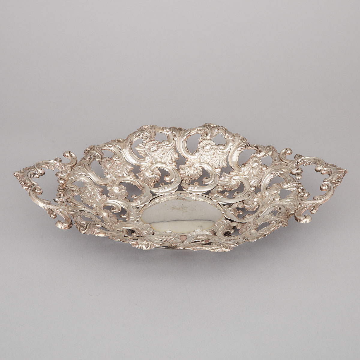 Austro-Hungarian Silver Repoussé Two-Handled Oval Basket, mid-19th century