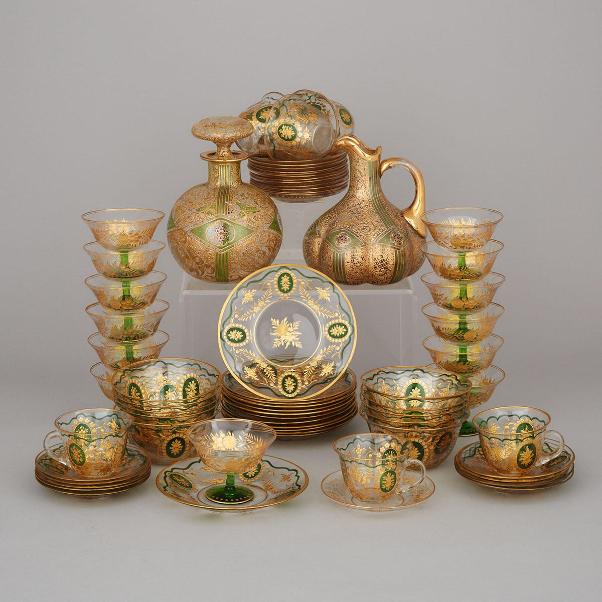 Bohemian Engraved, Green Enameled and Gilt Glass Service, early 20th century