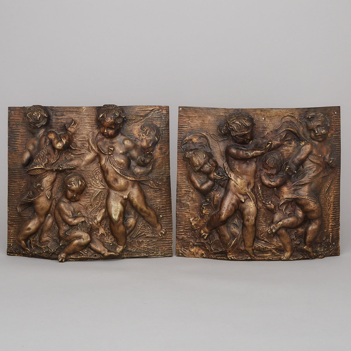 Pair of Neoclassical Patinated Bronze Relief Panels, early 20th century