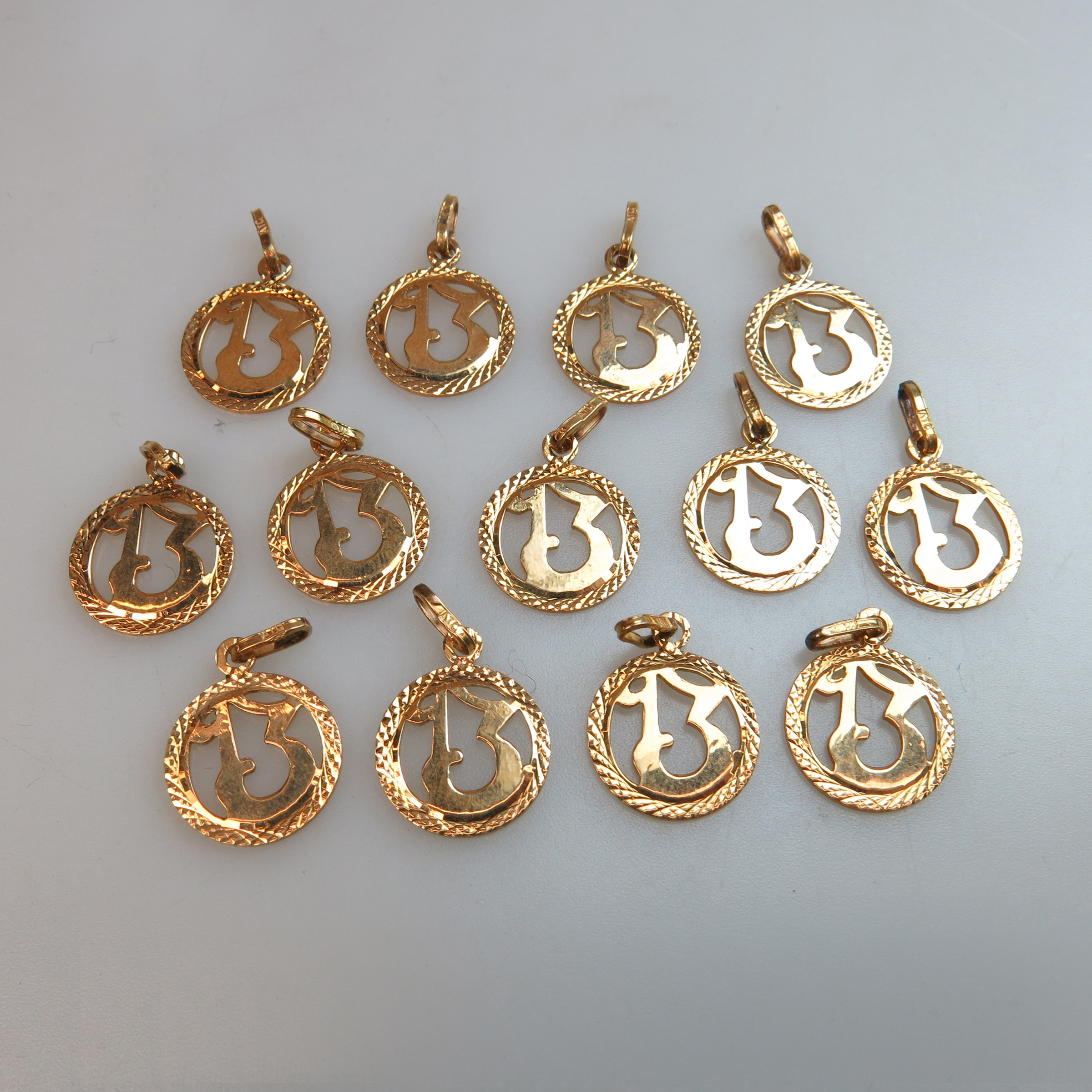 13 x 18k Yellow Gold Charms