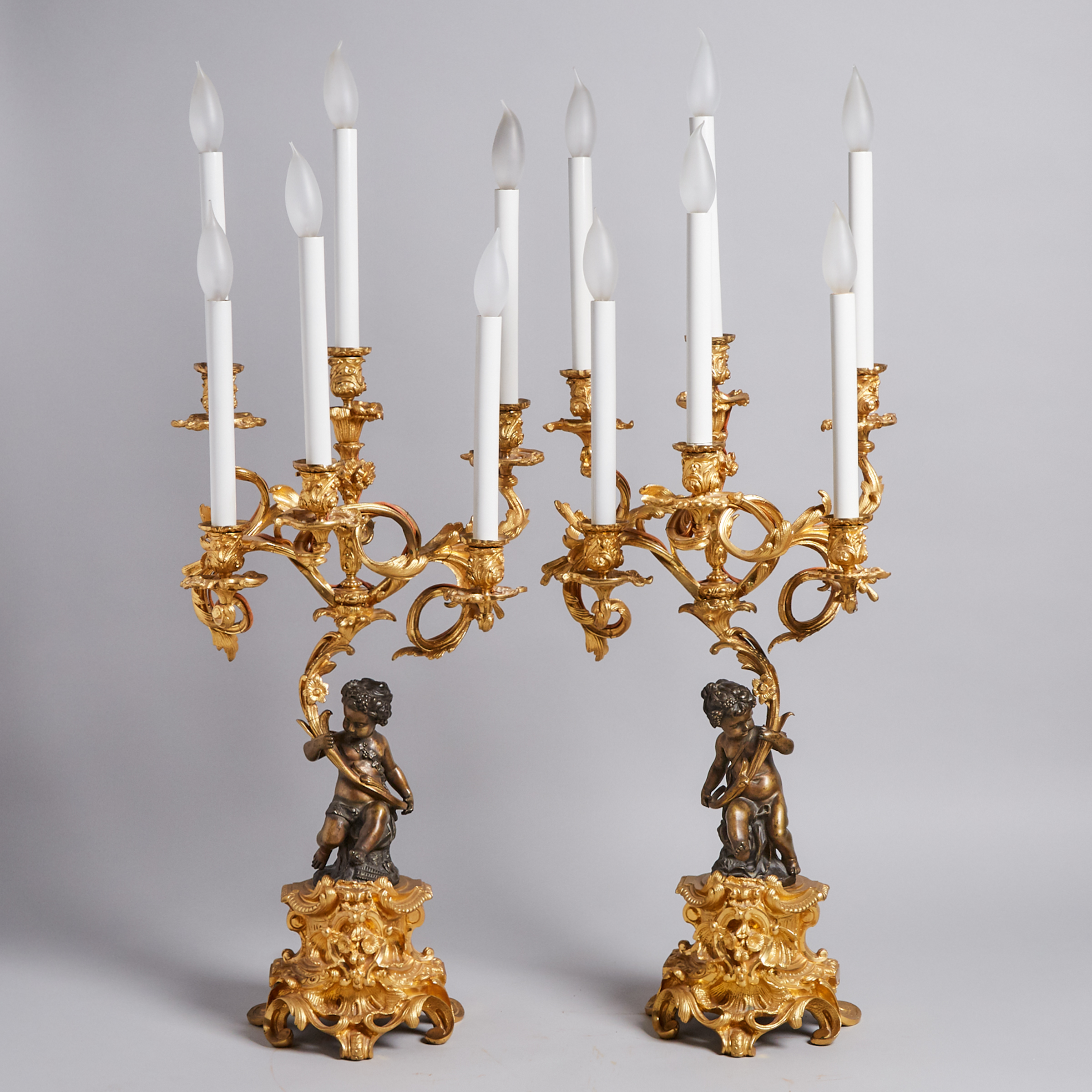 Pair of Napoleon III Gilt and Patinated Bronze Figural Candelabra, 20th century