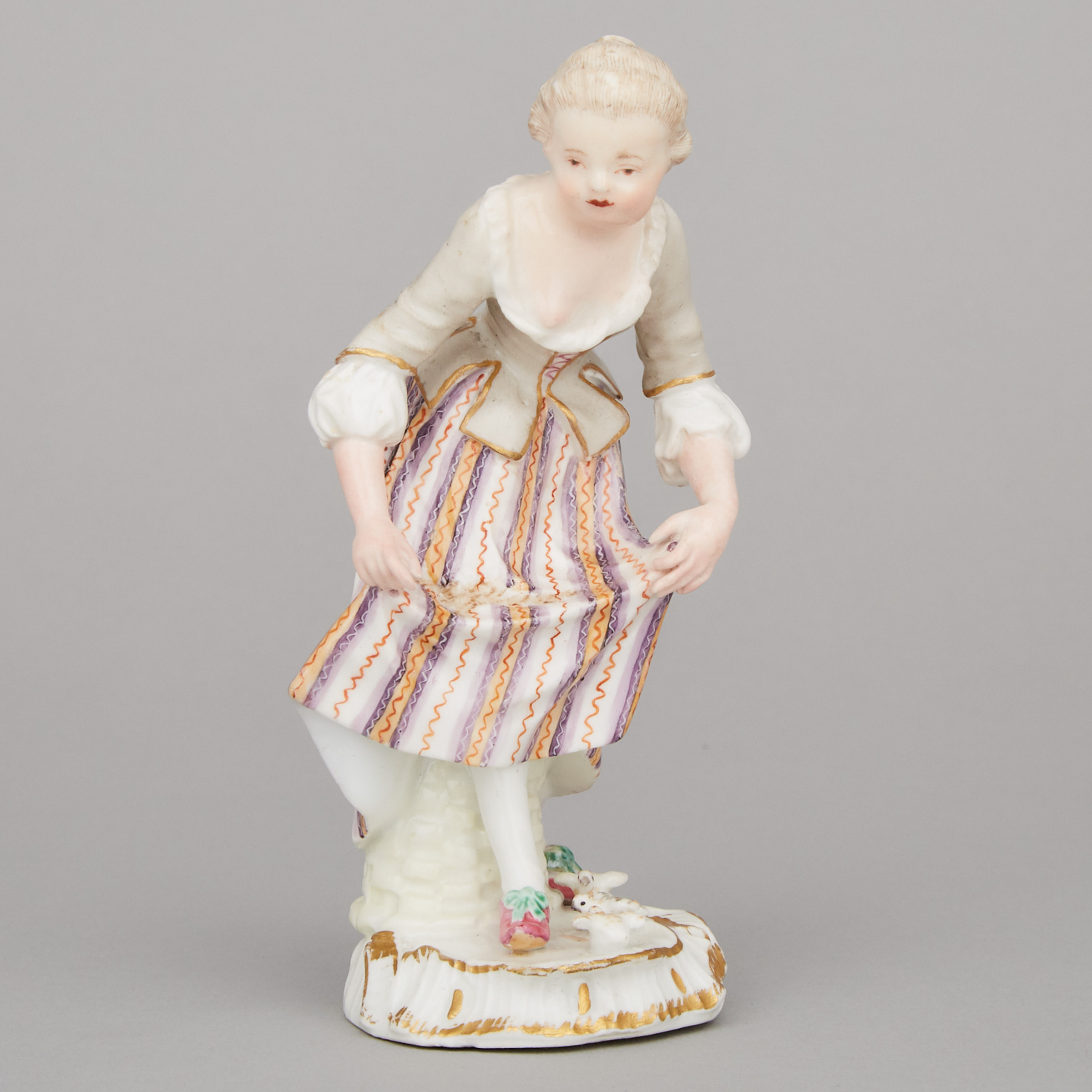 Meissen Figure of a Woman Feeding Chicks, late 18th/early 19th century