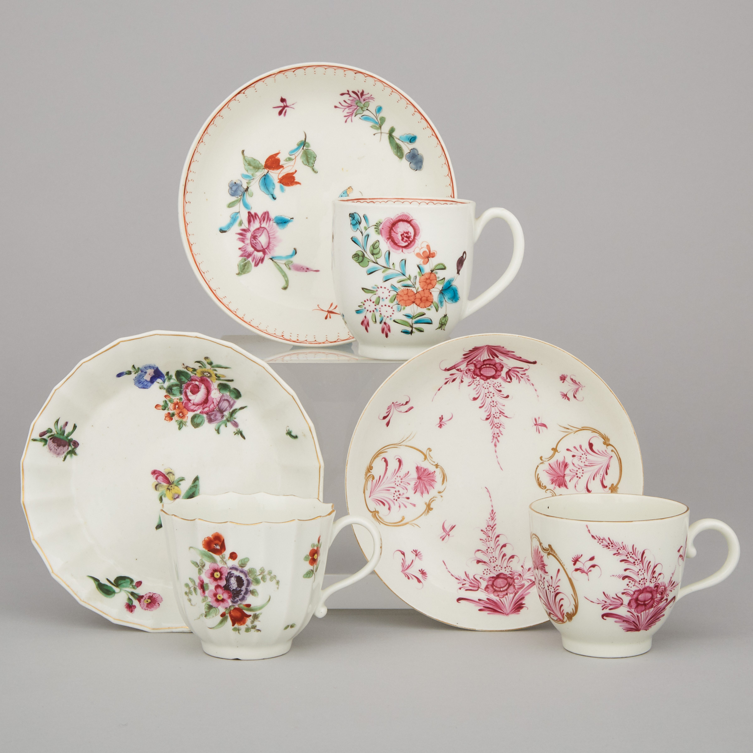 Three Worcester Floral Decorated Cups and Saucers, 18th century