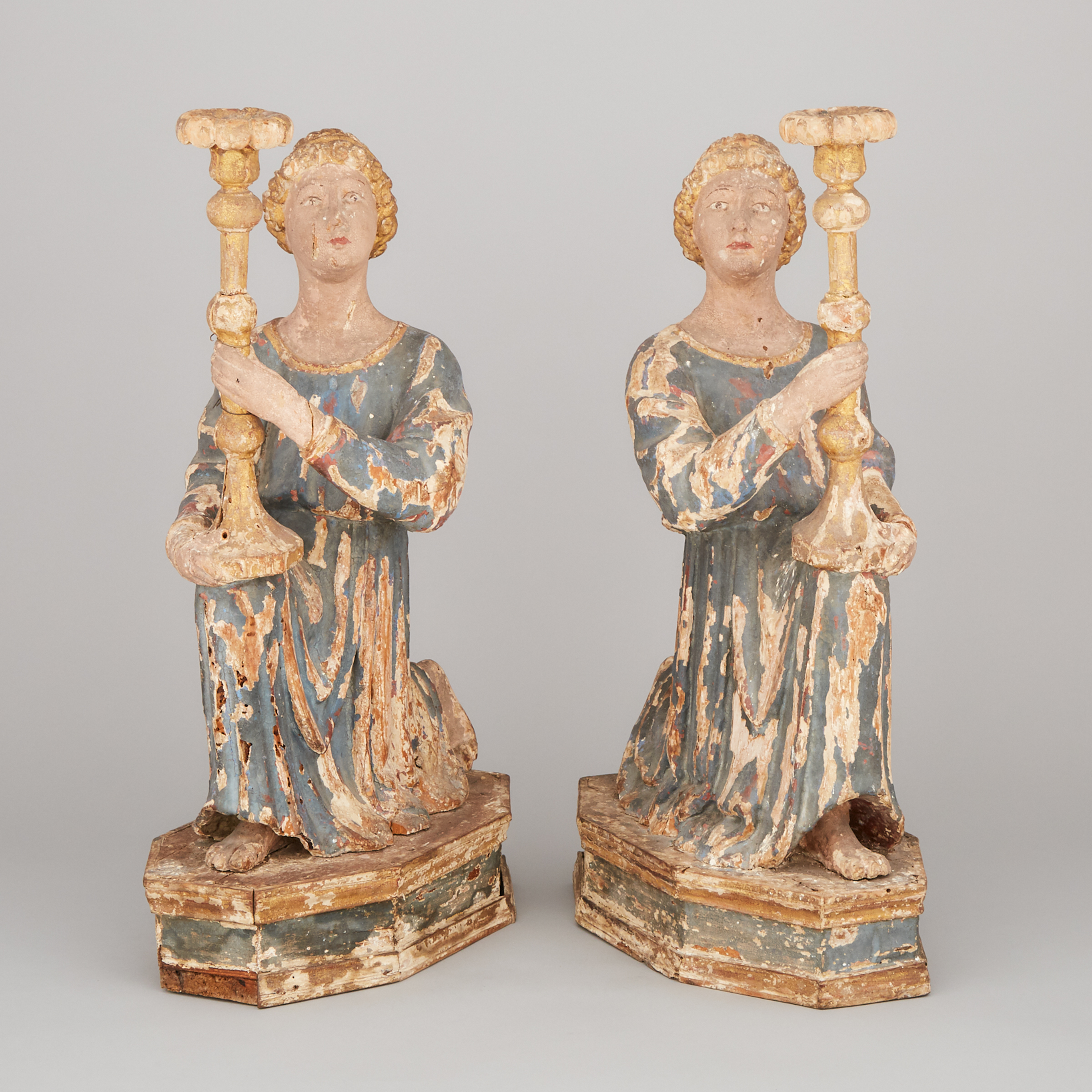 Pair of North Italian Carved and Polychromed Wood Figural Altar Torchères, mid 18th century