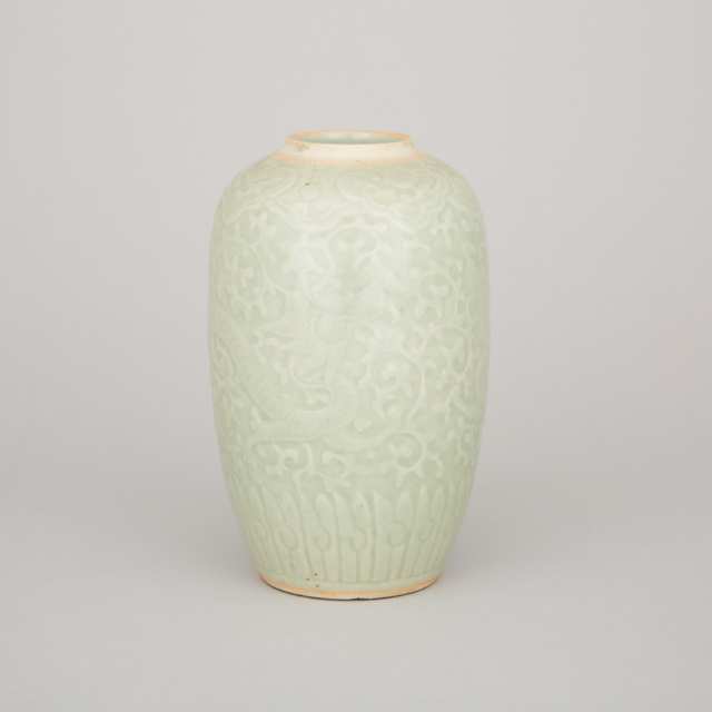 A Celadon Glaze Moulded 'Dragon' Jar, 19th Century