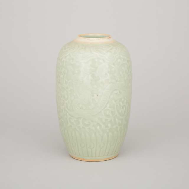 A Celadon Glaze Moulded 'Dragon' Jar, 19th Century
