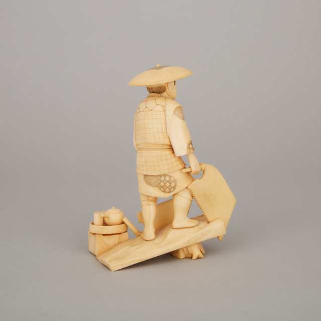 An Ivory Okimono of a Woodcutter, Meiji Period