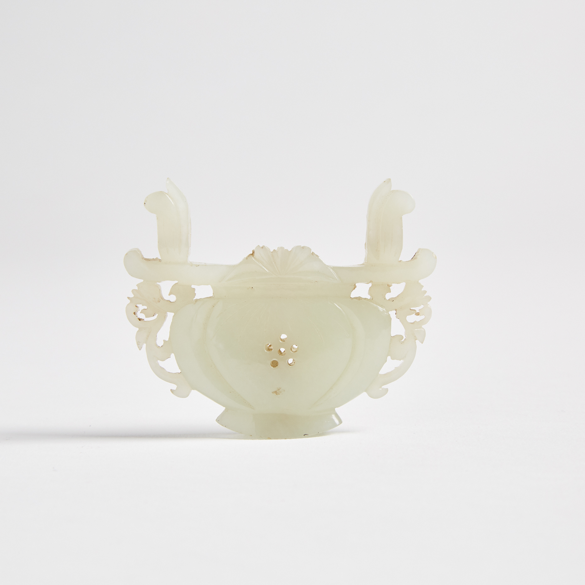 A Finely Carved Celadon White Jade 'Flower Basket' Lock Plaque