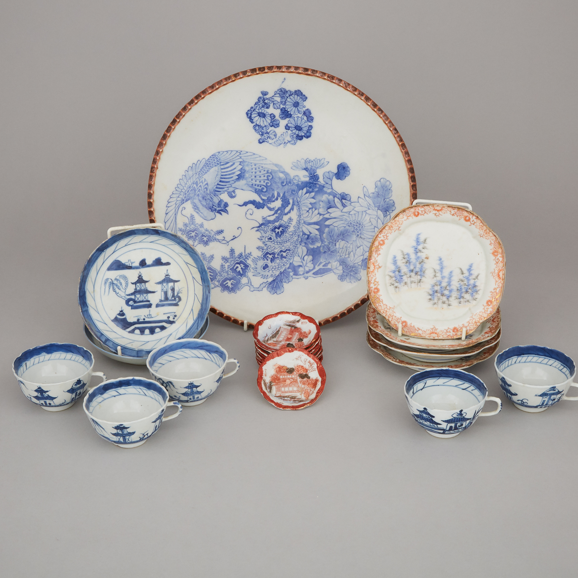 A Group of Twenty-One Japanese Kutani and Blue and White Porcelain Wares, 19th/Early 20th Century
