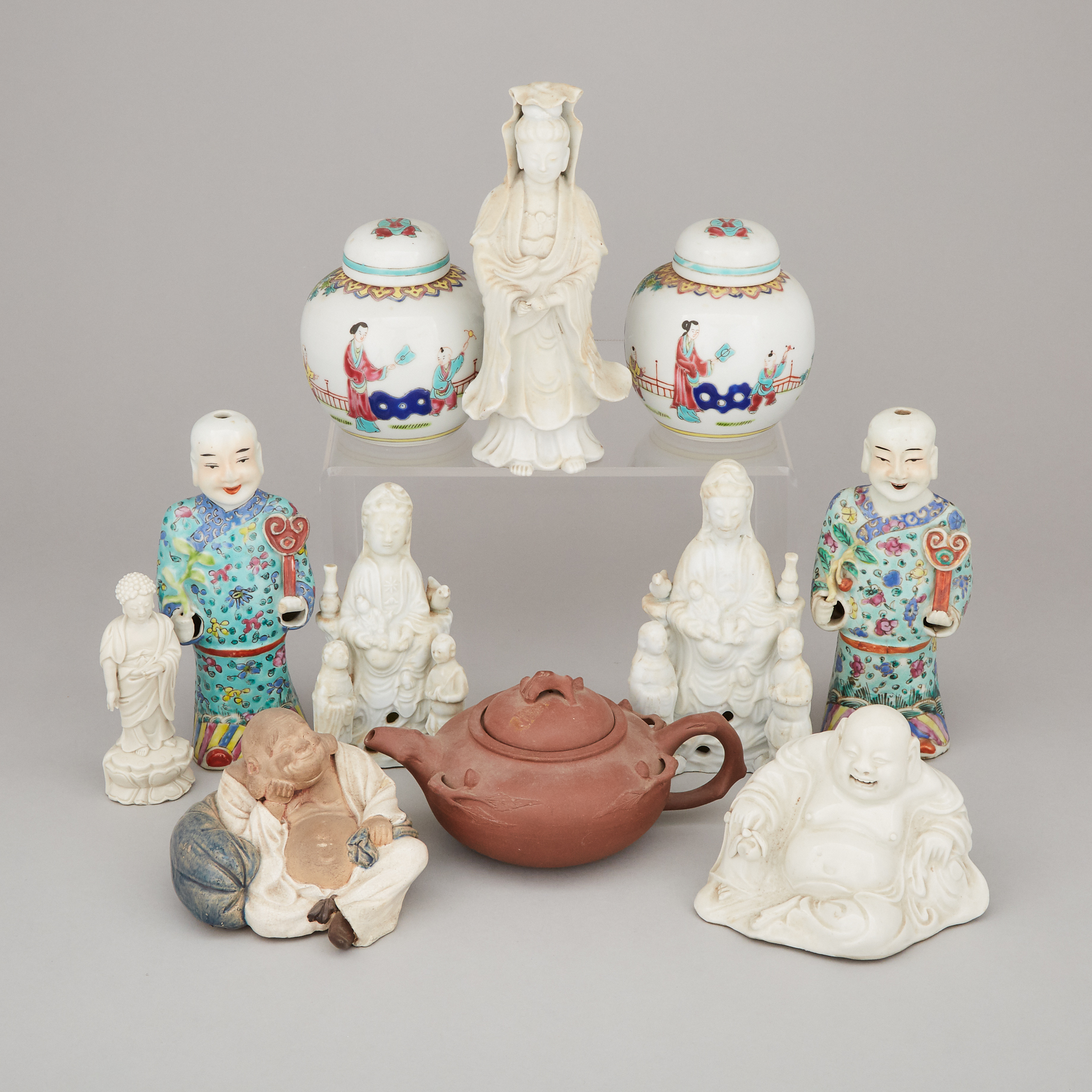 A Group of Eleven Chinese Famille Rose, Blanc de Chine, and Yixing Ceramic Wares