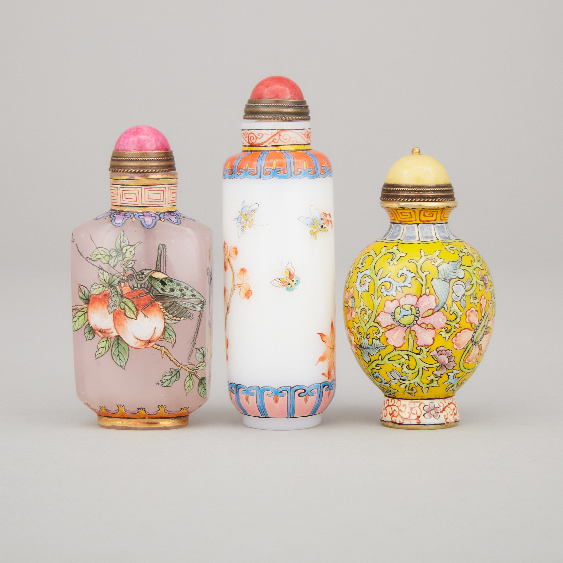 A Group of Three Glass Snuff Bottles