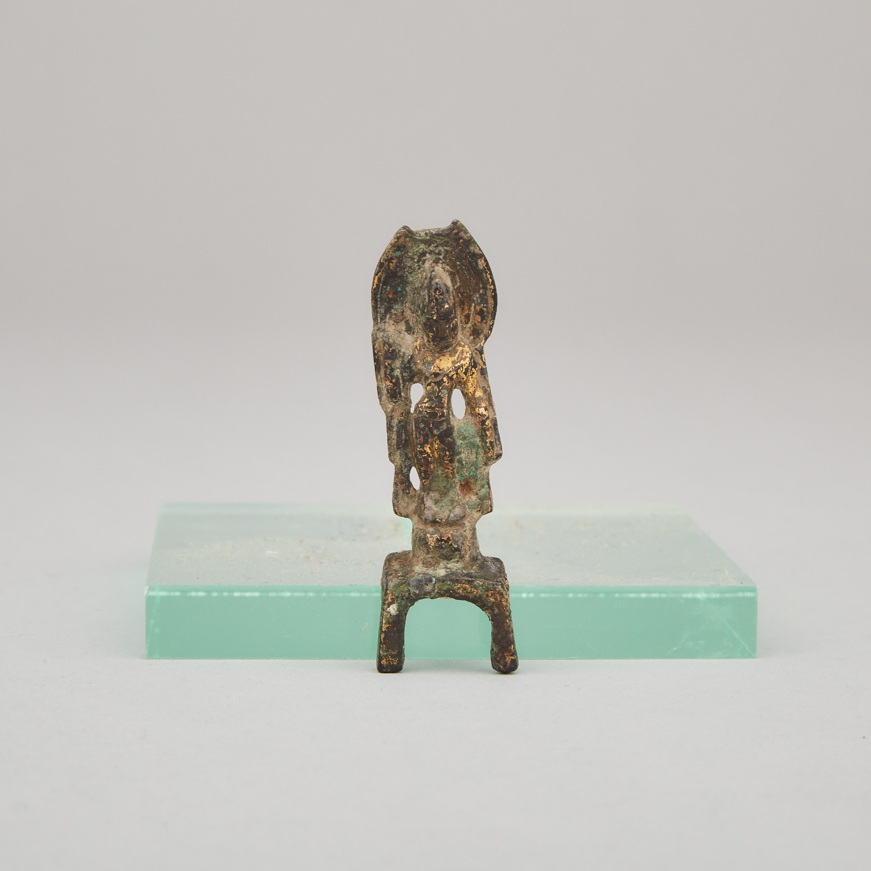 A Miniature Gilt Bronze Standing Avalokitesvara, Possibly Tang Dynasty