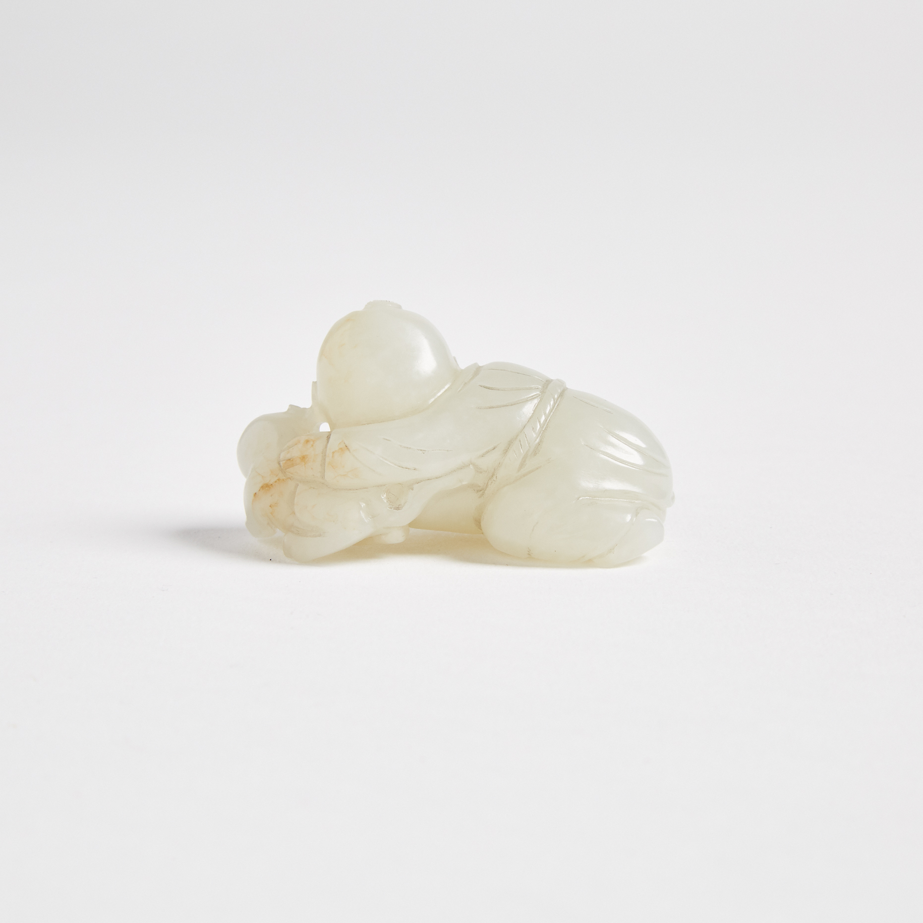 A White Jade Carved Boy with Beast