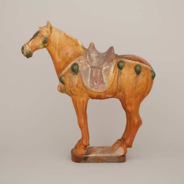 A Large Sancai-Glazed Pottery Figure of a Horse, Tang Dynasty