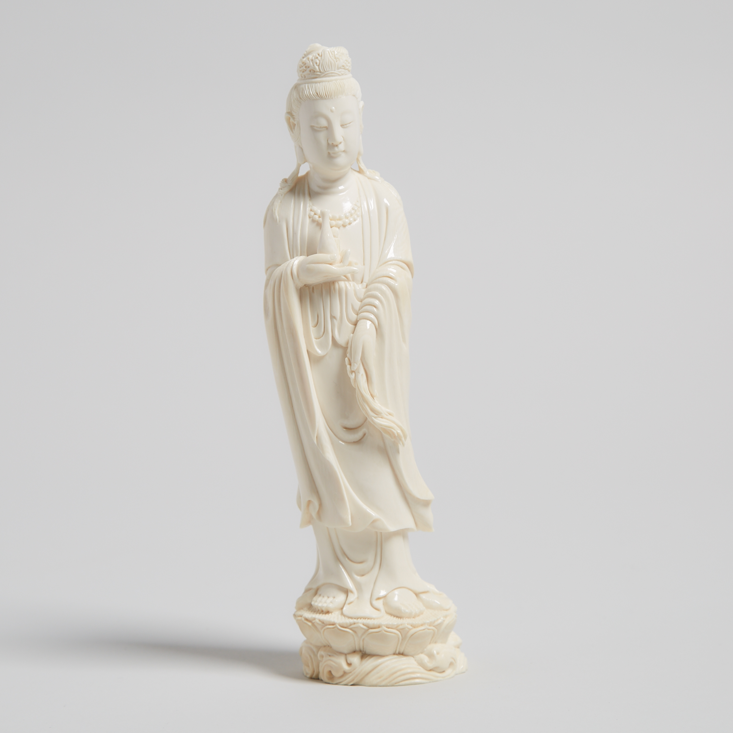 A Finely Carved Ivory Figure of Guanyin, Circa 1940