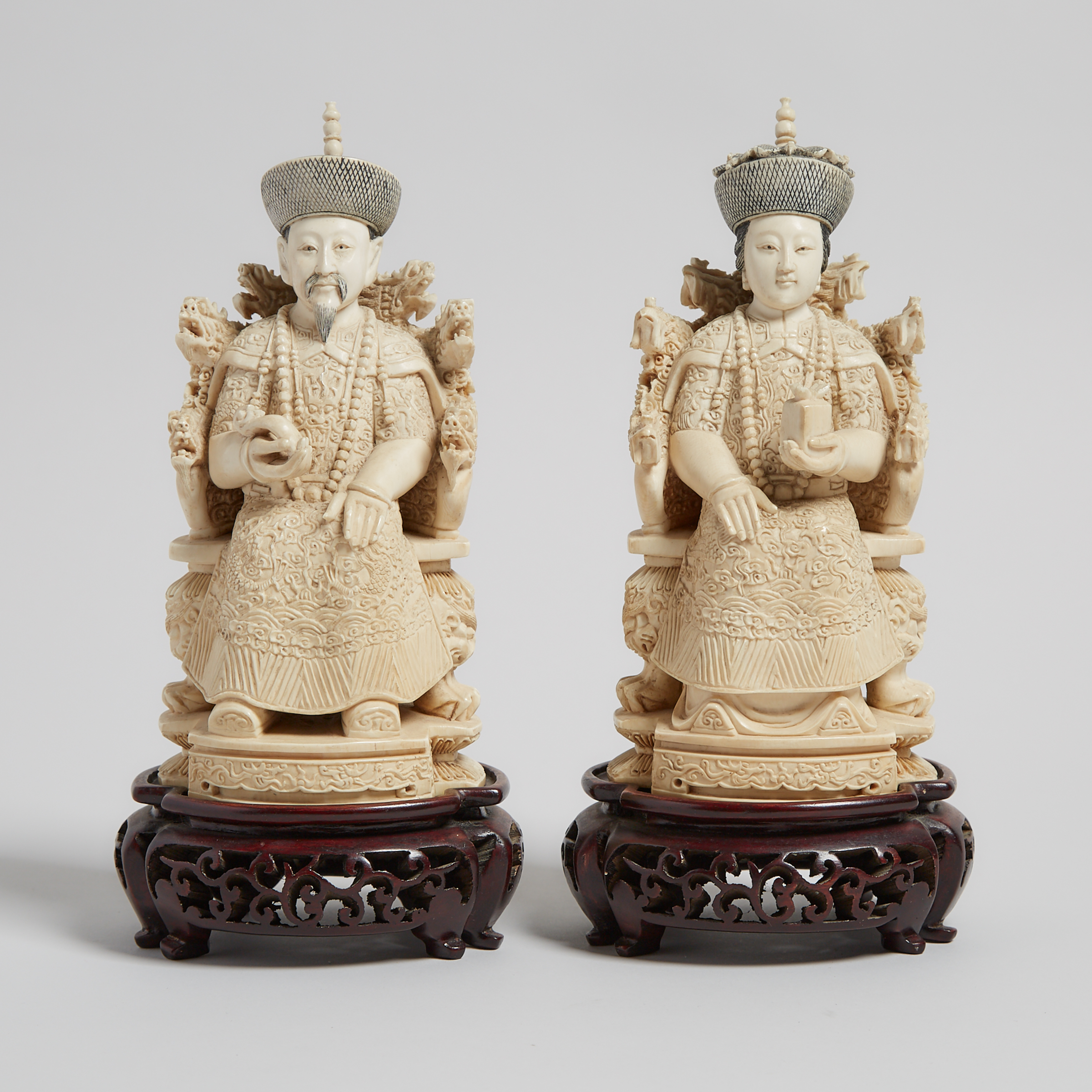 An Ivory Carved Seated Emperor and Empress Pair, Circa 1940