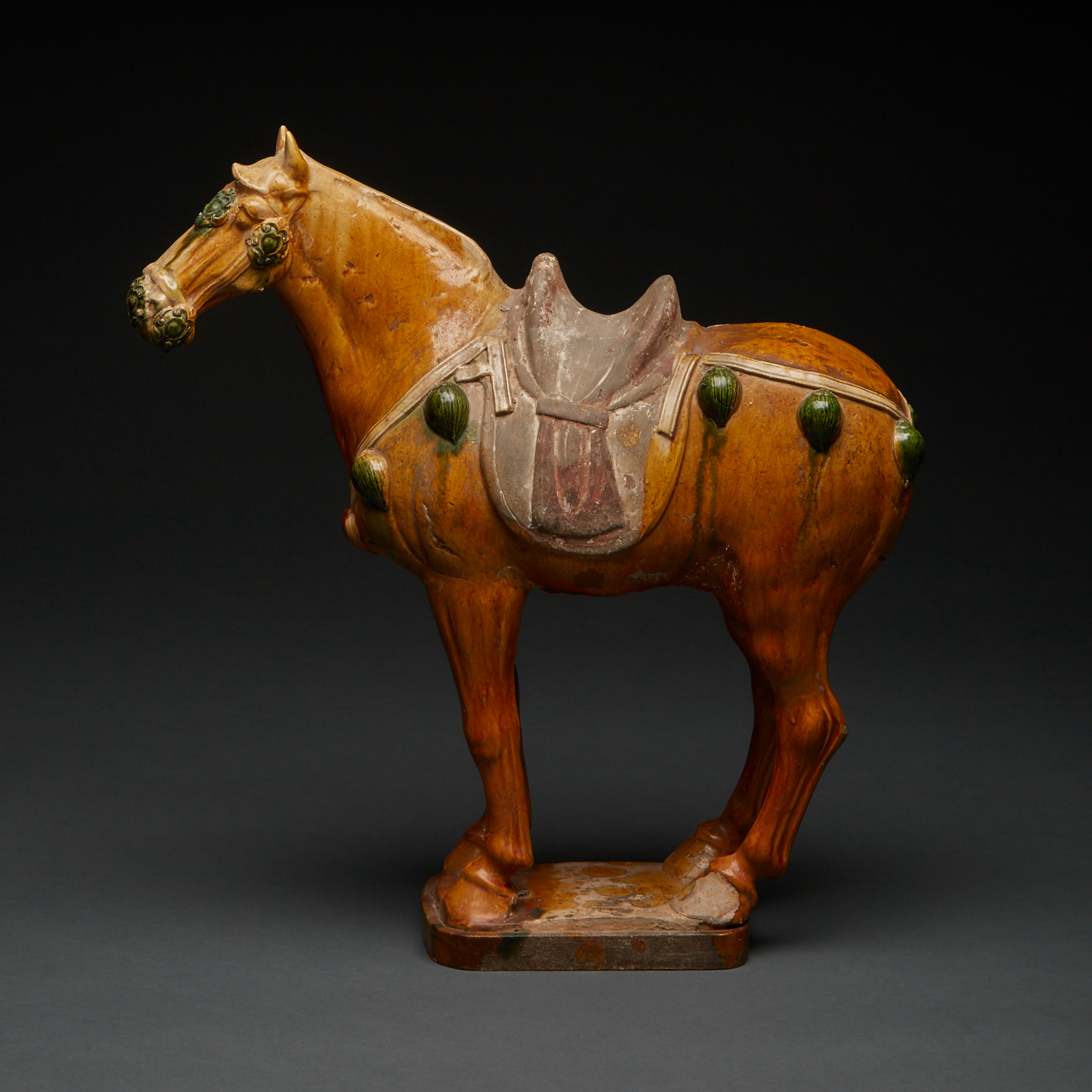 A Large Sancai-Glazed Pottery Figure of a Horse, Tang Dynasty