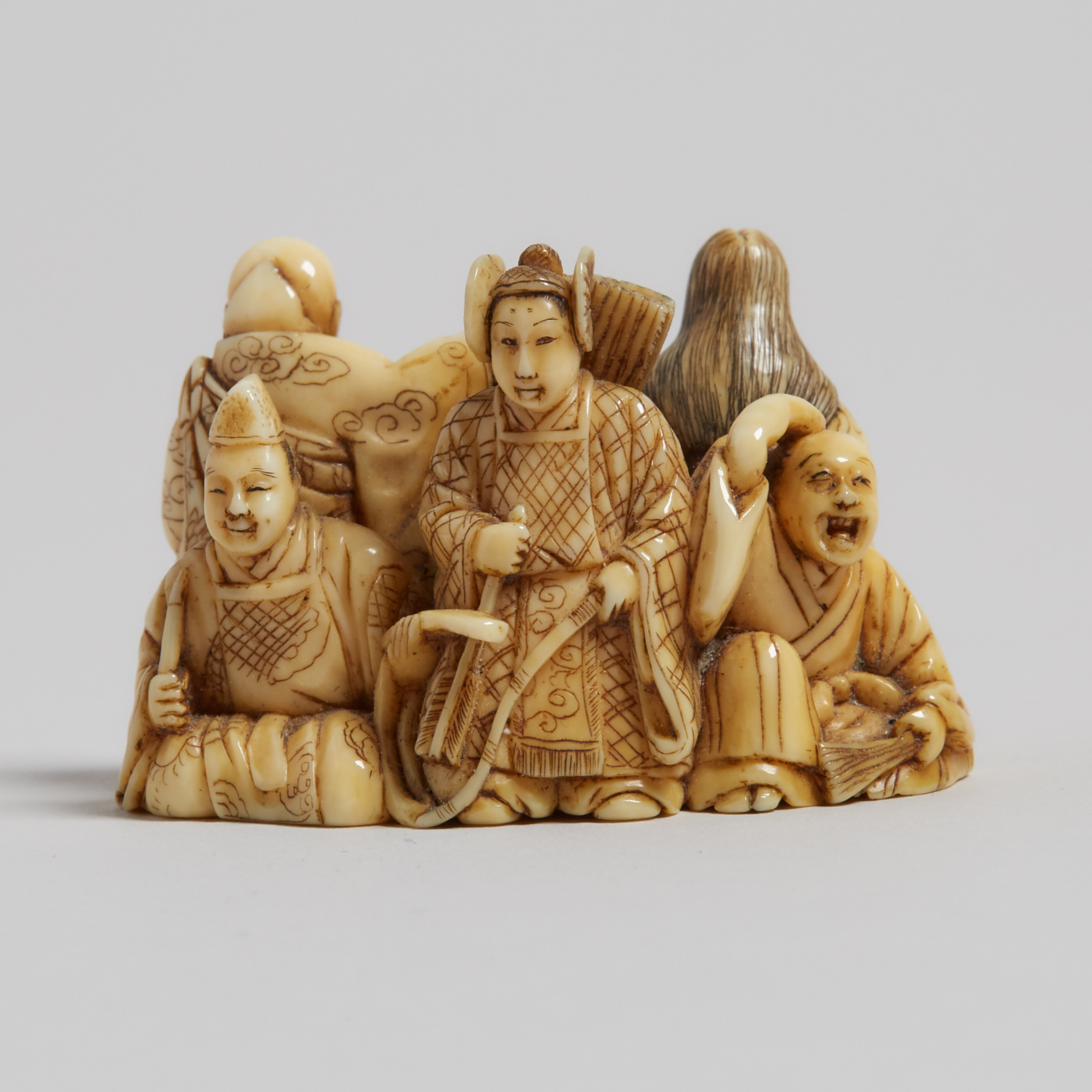 An Ivory Carved Netsuke Group of Six Poets, 19th Century