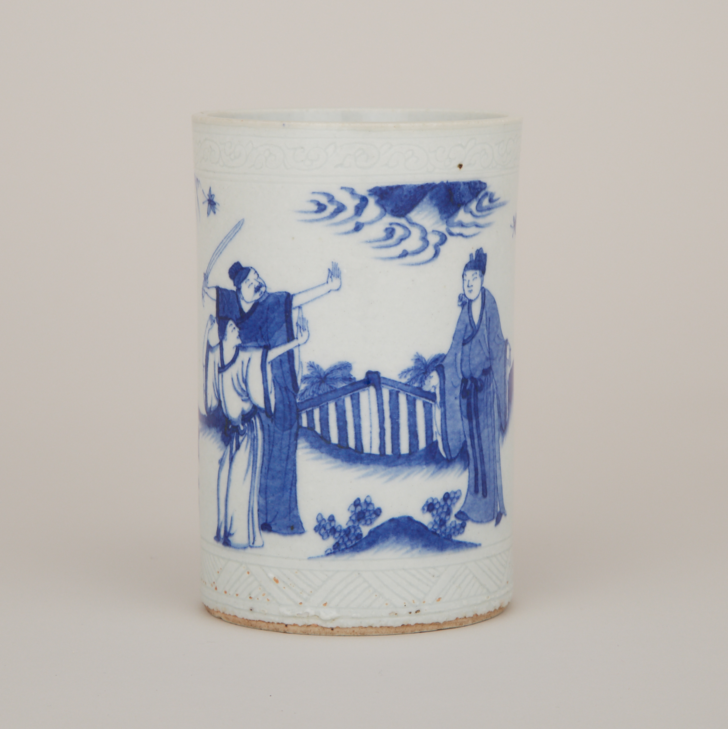 A Small Blue and White Figural Brushpot
