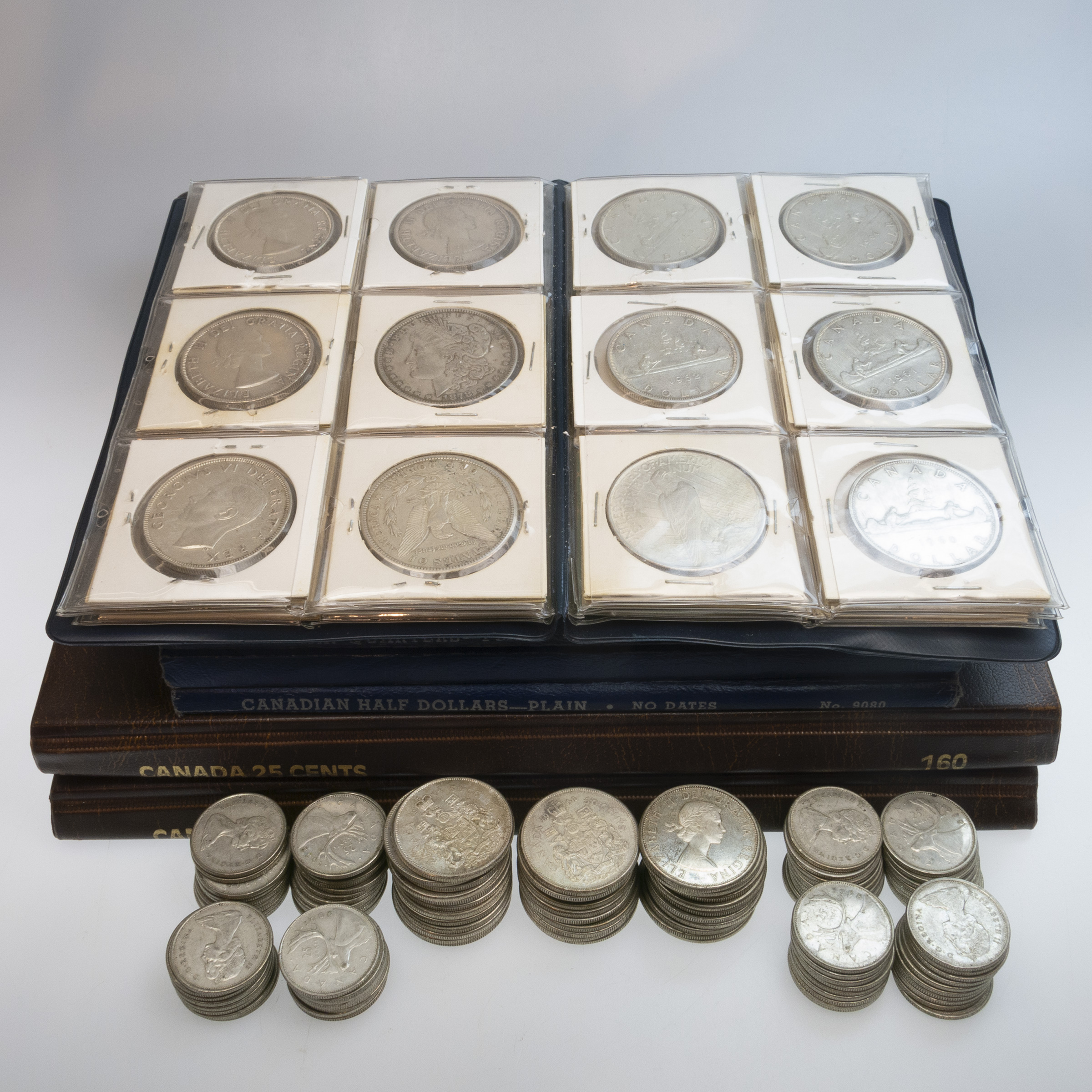 Quantity Of Canadian And American Silver Dollars, Half Dollars & Quarters