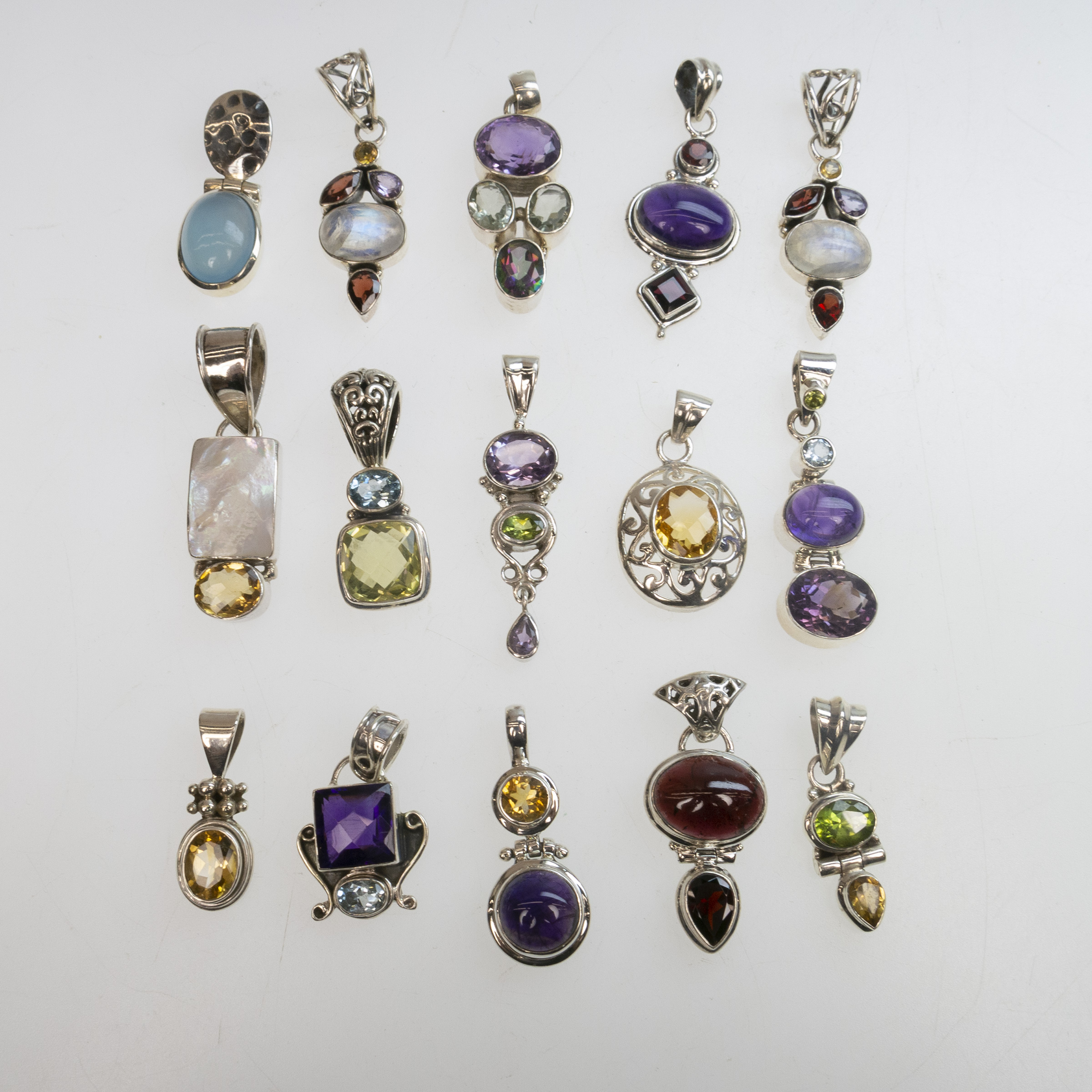 15 Various Small Sterling Silver Pendants