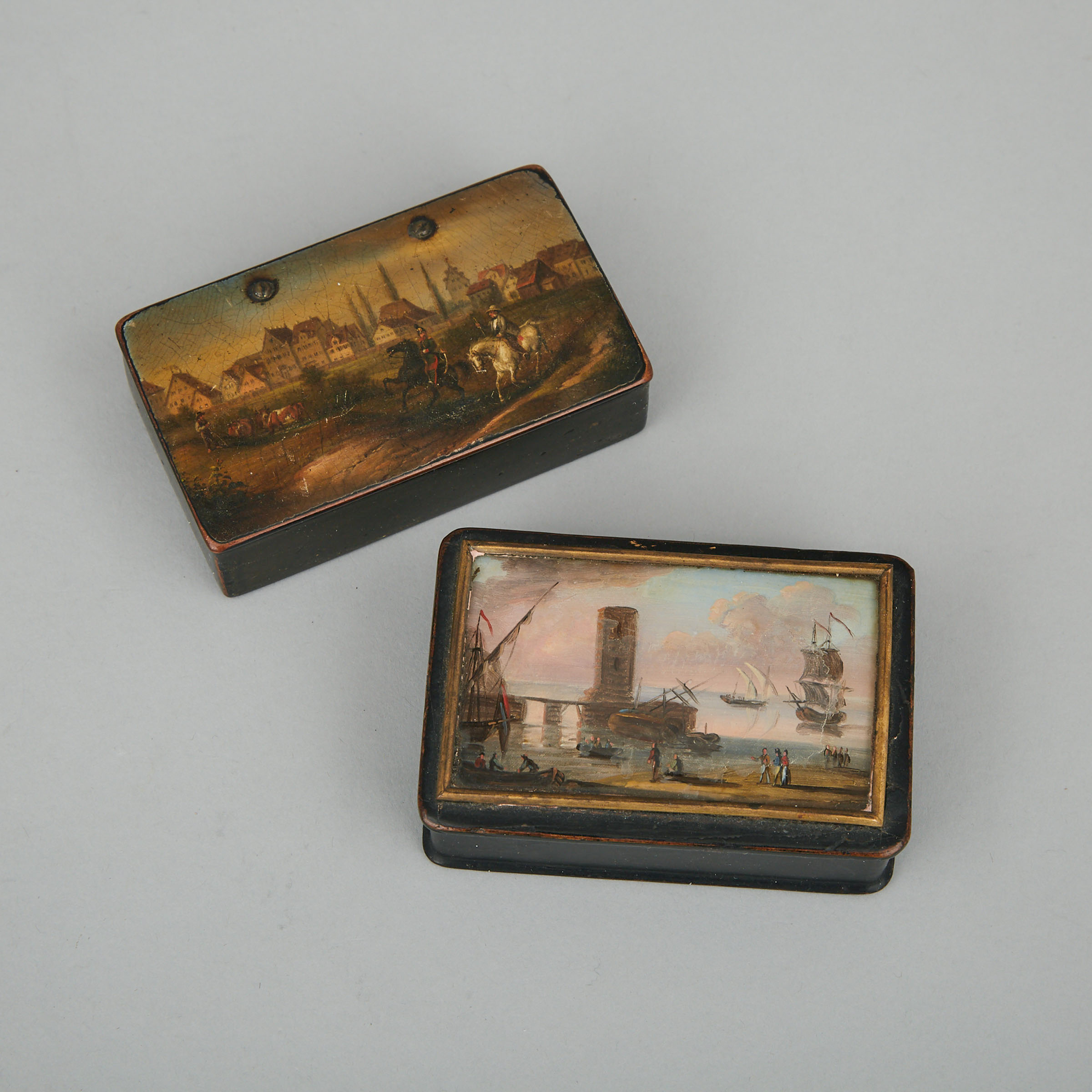 Two Continental Papier Maché Snuff Boxes, early 19th century