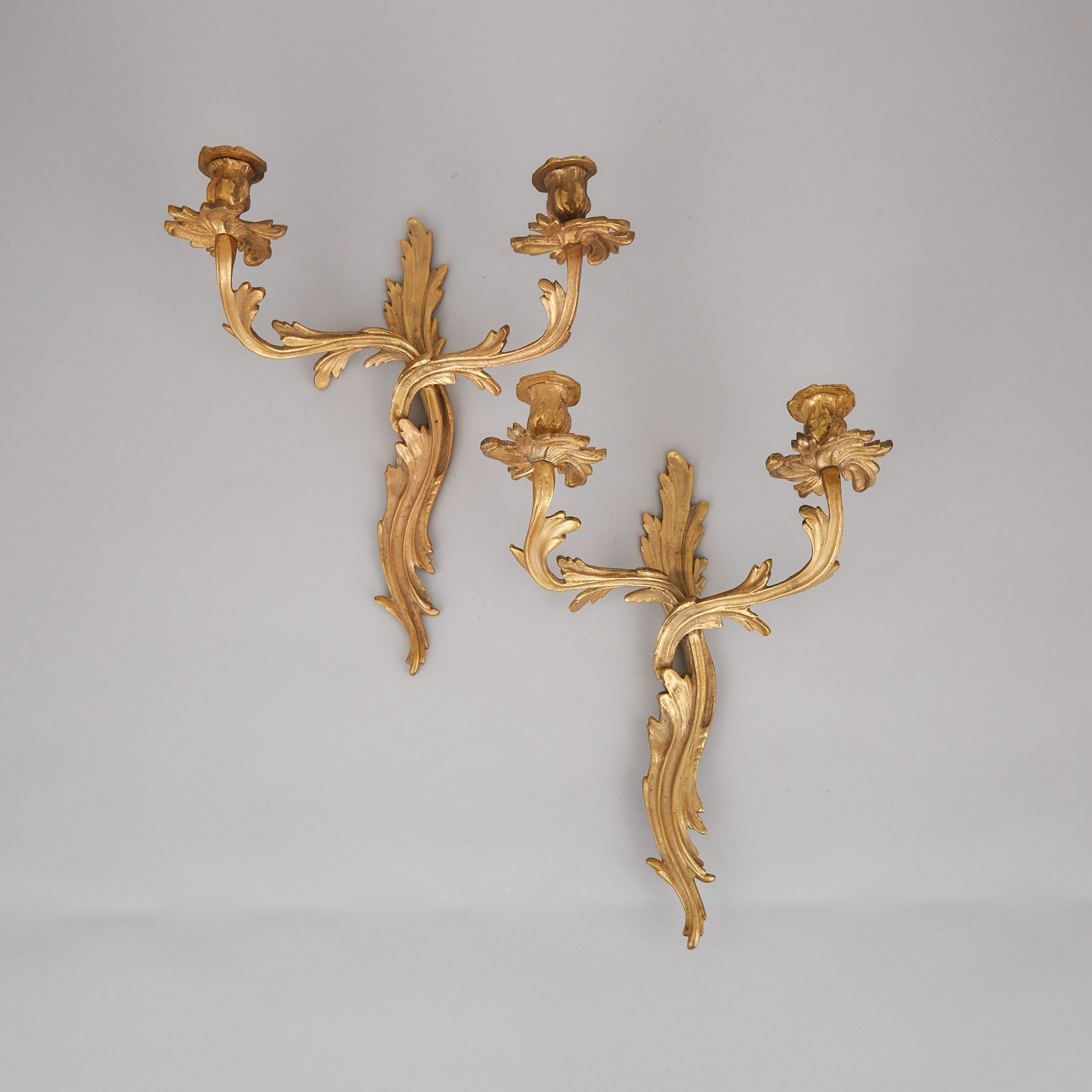 Pair of French Rococo Gilt Bronze Two Light Wall Sconces, mid 20th century