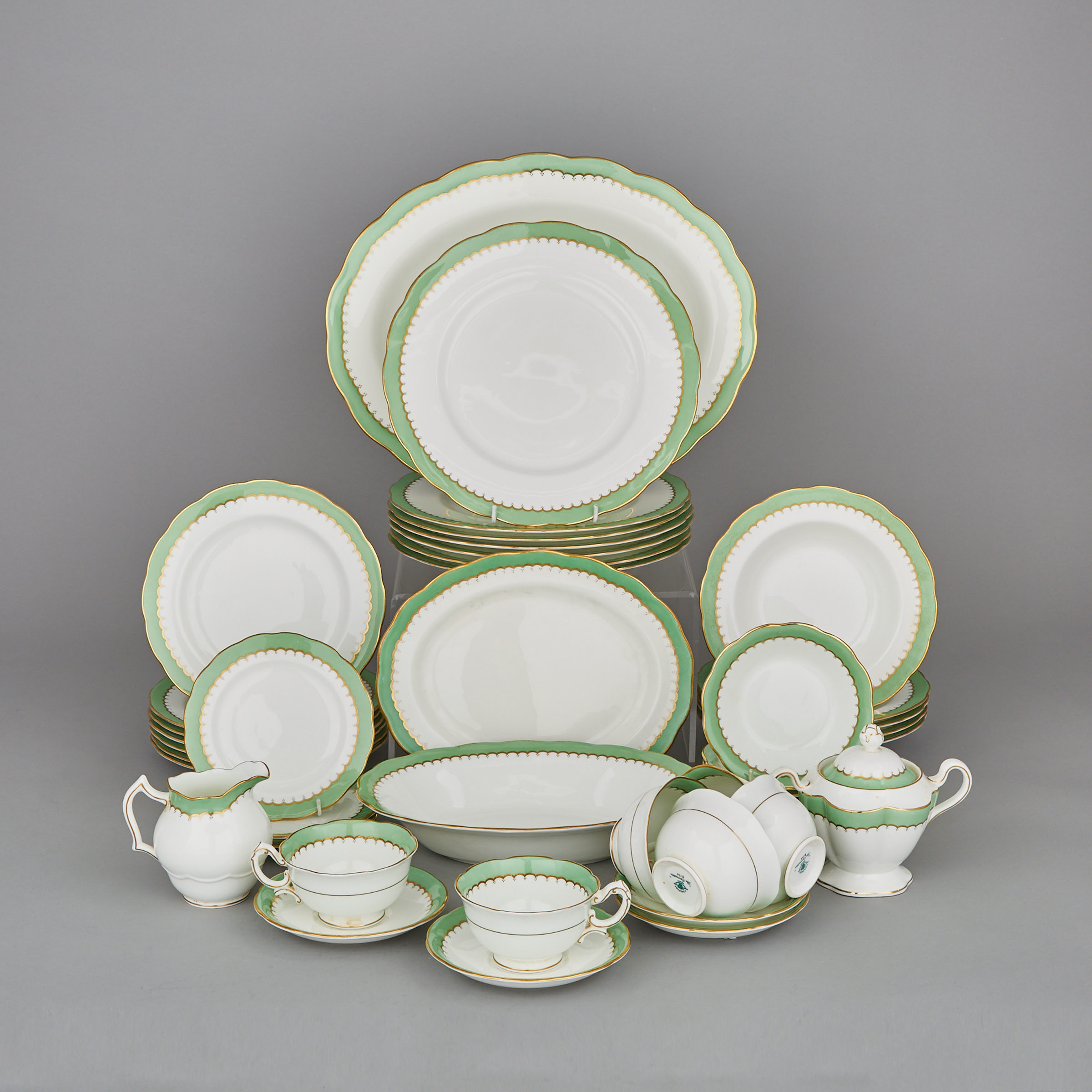Apple Green and Gilt 'The Coronation' Pattern Part-Service, mainly Coalport, 20th century